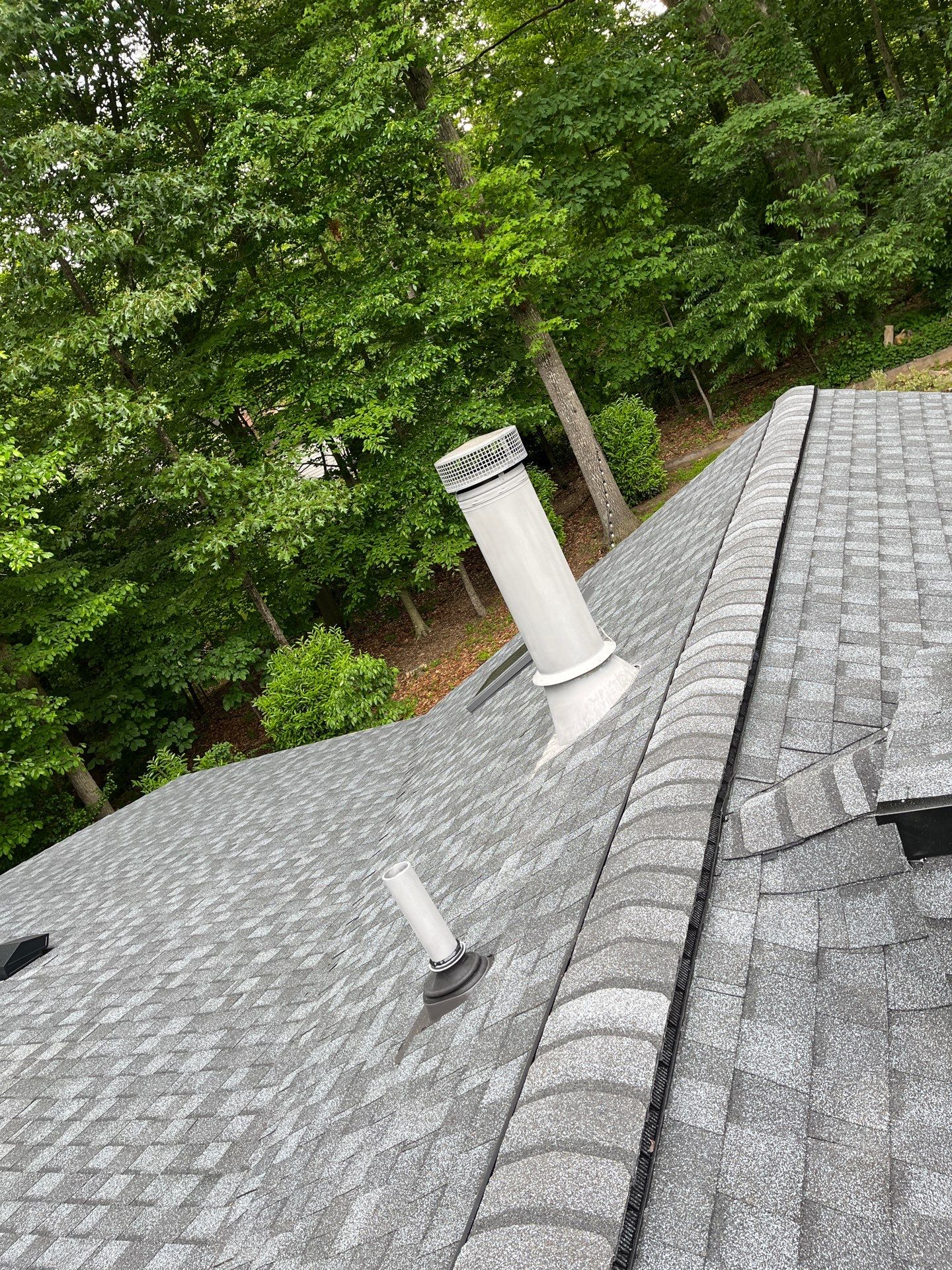 Oakton: Roof Replacement With CertainTeed Landmark Designer Shingles in Pewter by RM Banning, Inc.