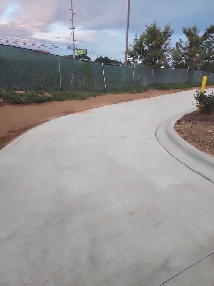 Driveway Clean using cleaner by Power Wash Masters LLC