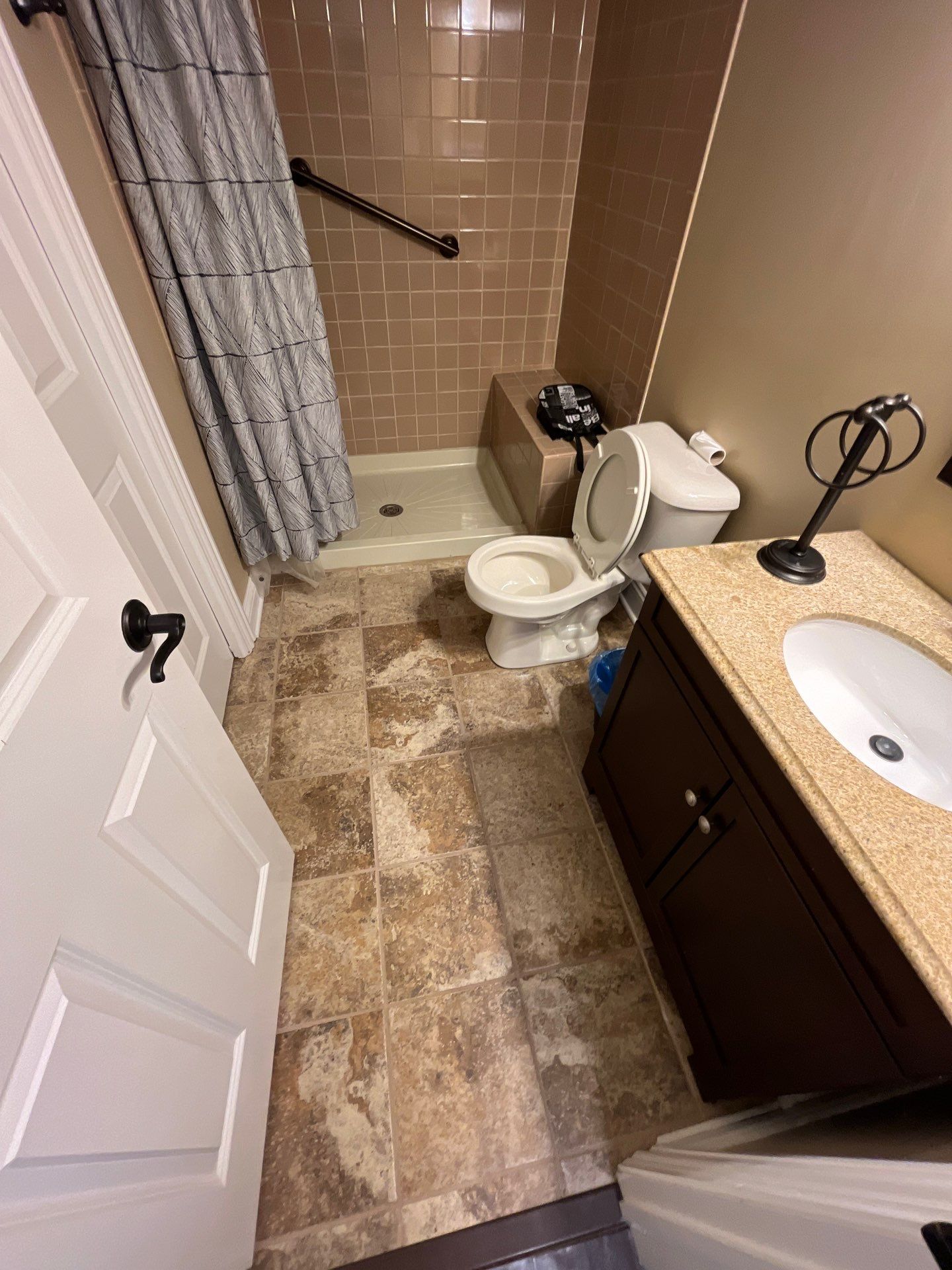A Tan Bath Gets A Marble Makeover! by Snap Home Solutions
