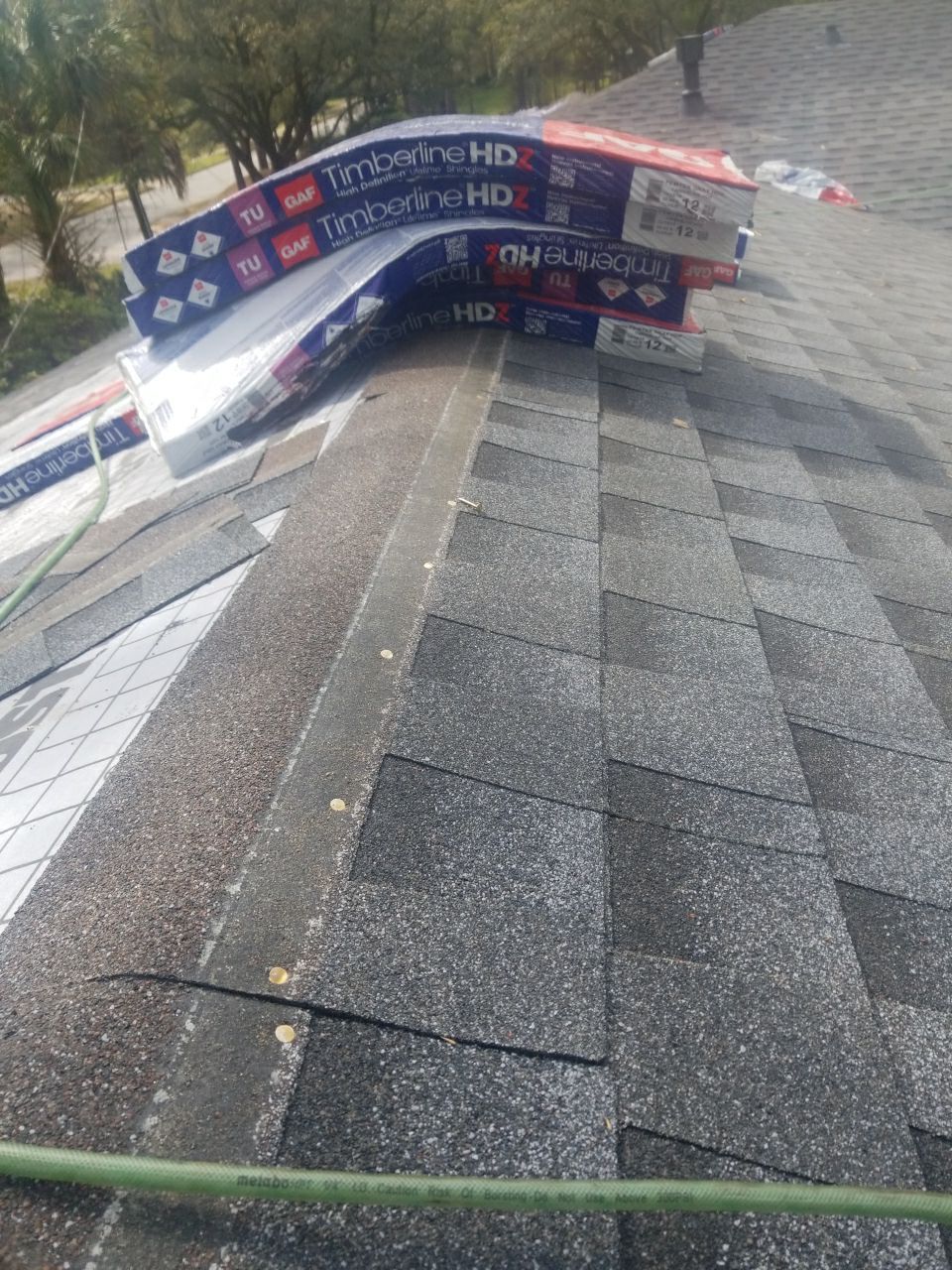 Residential Roofing Installation using Roof Replacement by American Roofing & Construction LLC