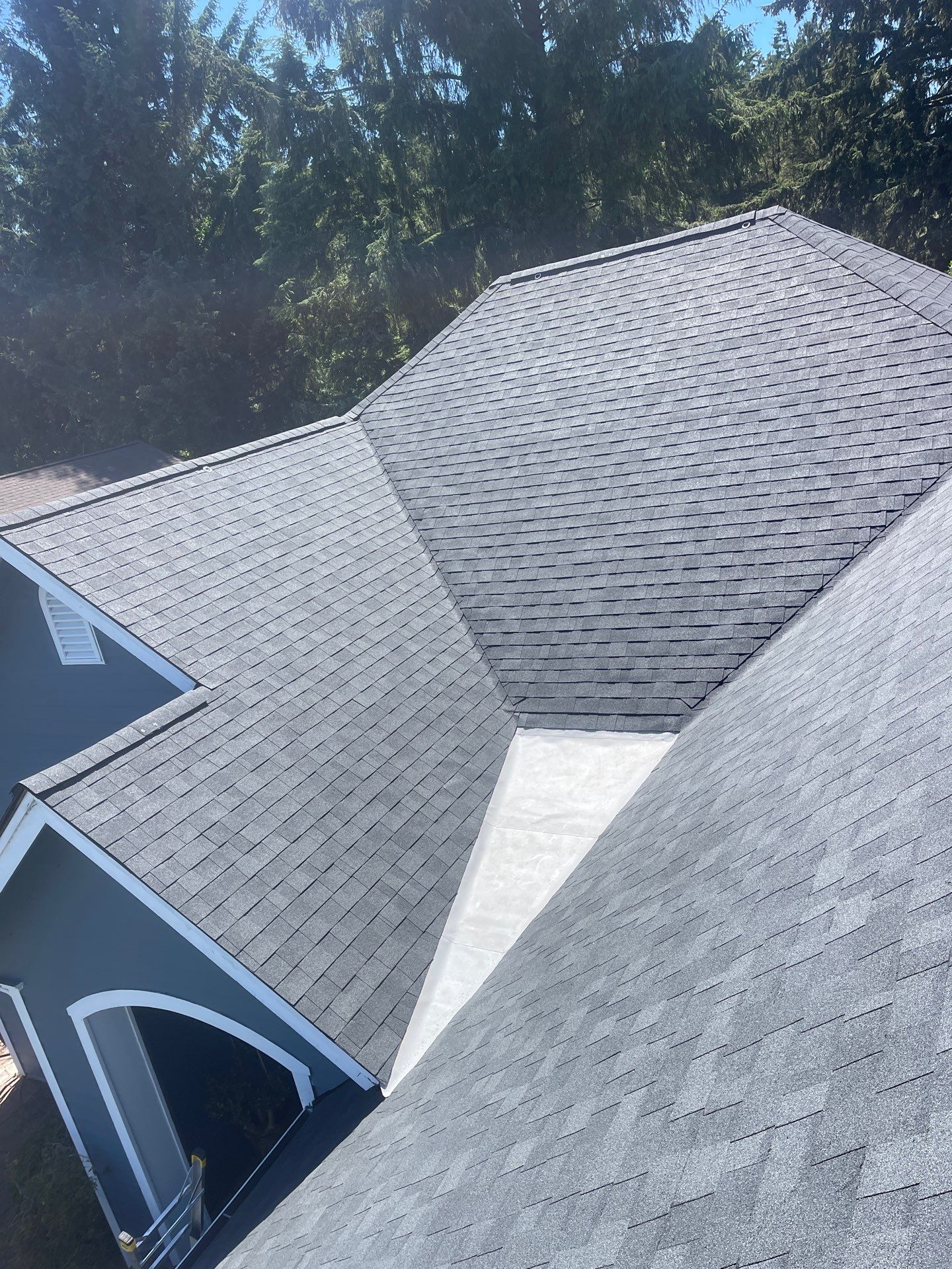 Residential Reroof with Architectural Shingles and Skylights in Coos Bay by BEST Roofing & Waterproofing