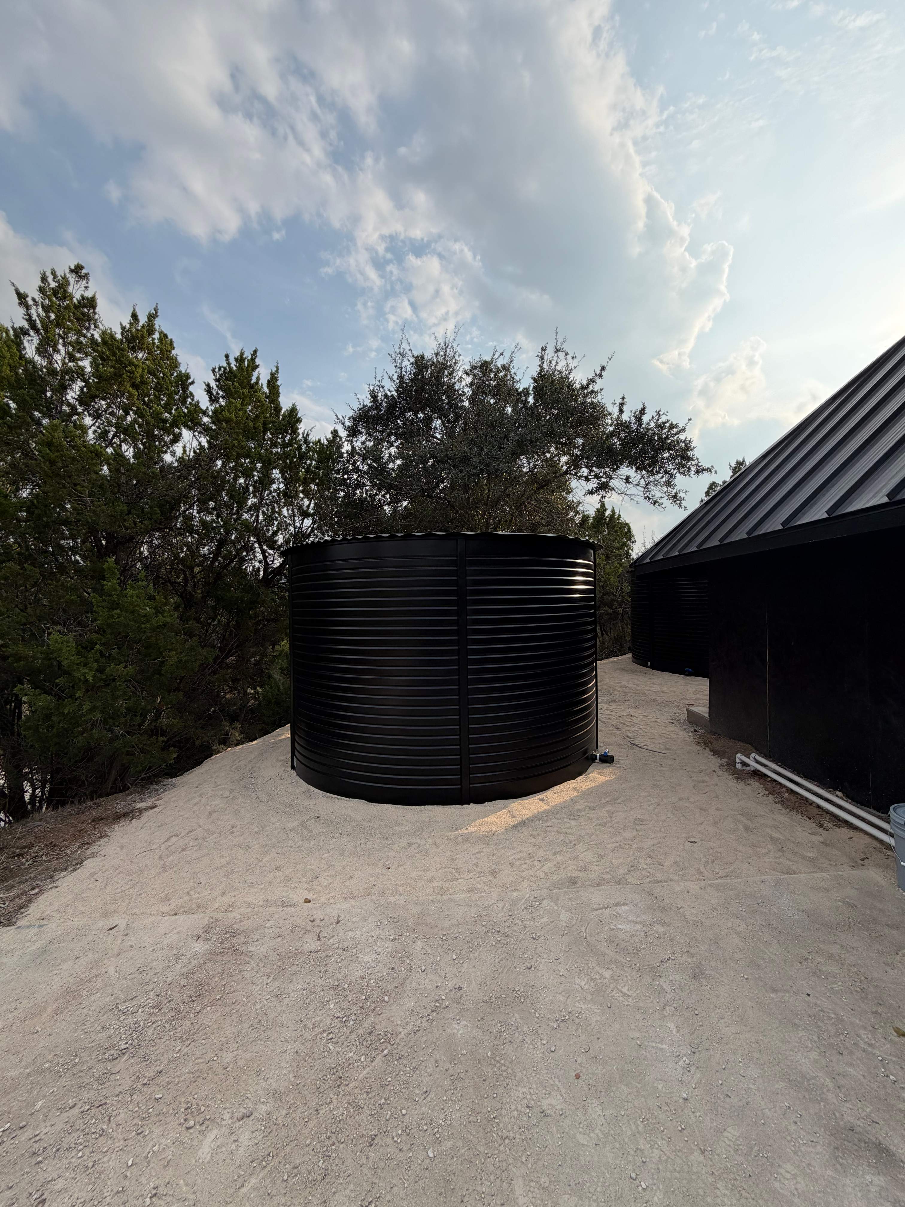 5k & 16.4k Pioneer Dome Roof Painted Black by Hill Country Rain Water