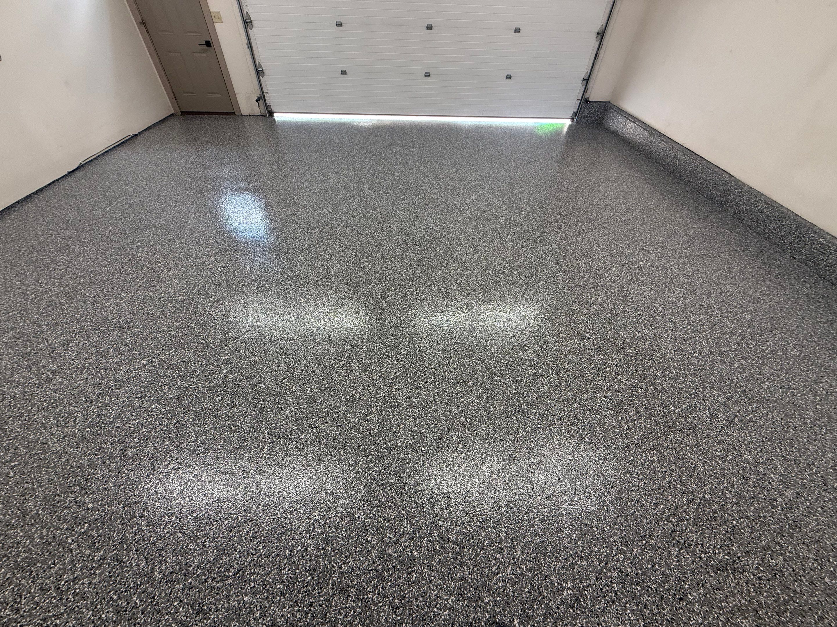 Smoke Flake Garage Floor Coating in Dell Rapids by Select Painting, Coatings & Garage Cabinets