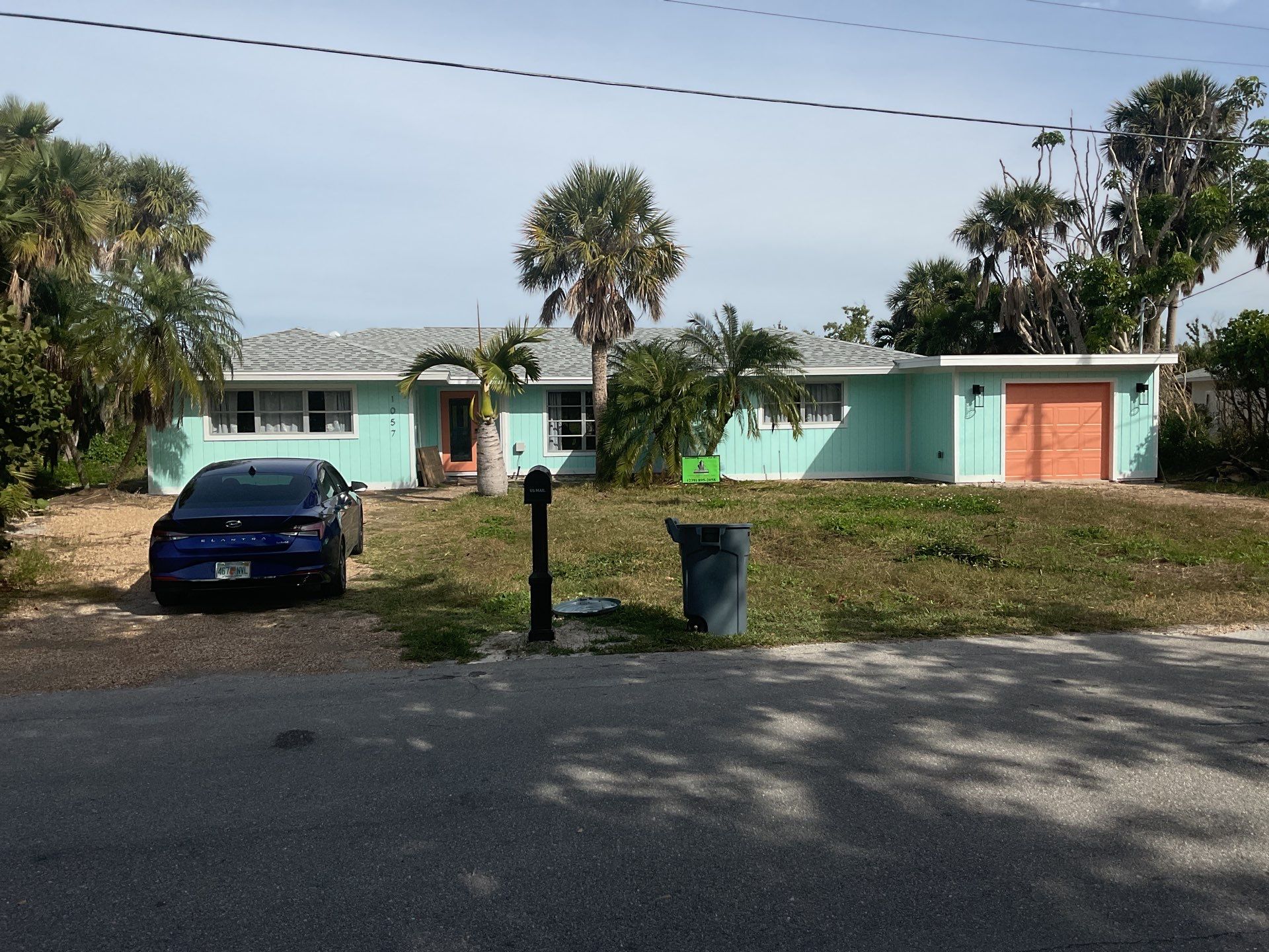White Seamless Gutters Installation in Sanibel FL by Gutter Professors