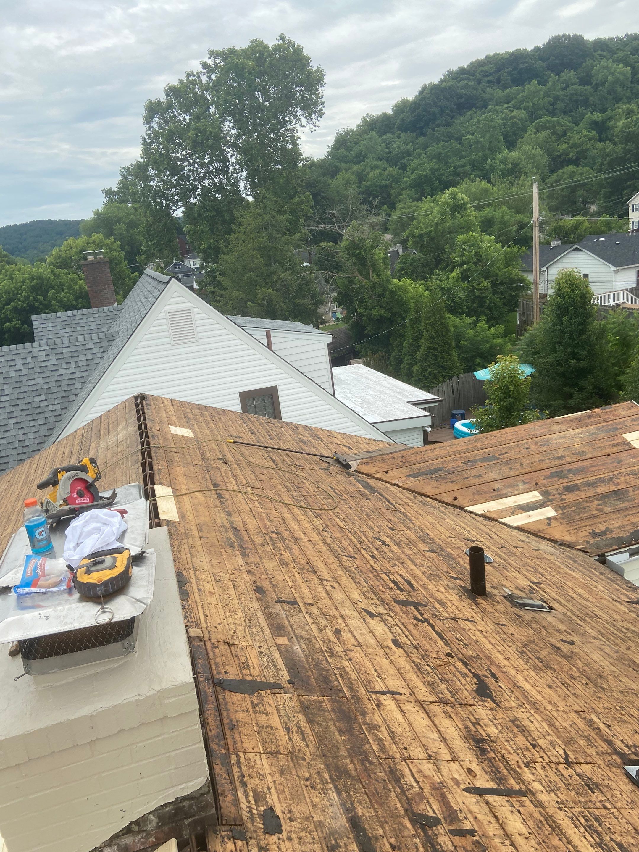 Metal Roofing, Skylights, Porch Build by Secure Construction Company Inc