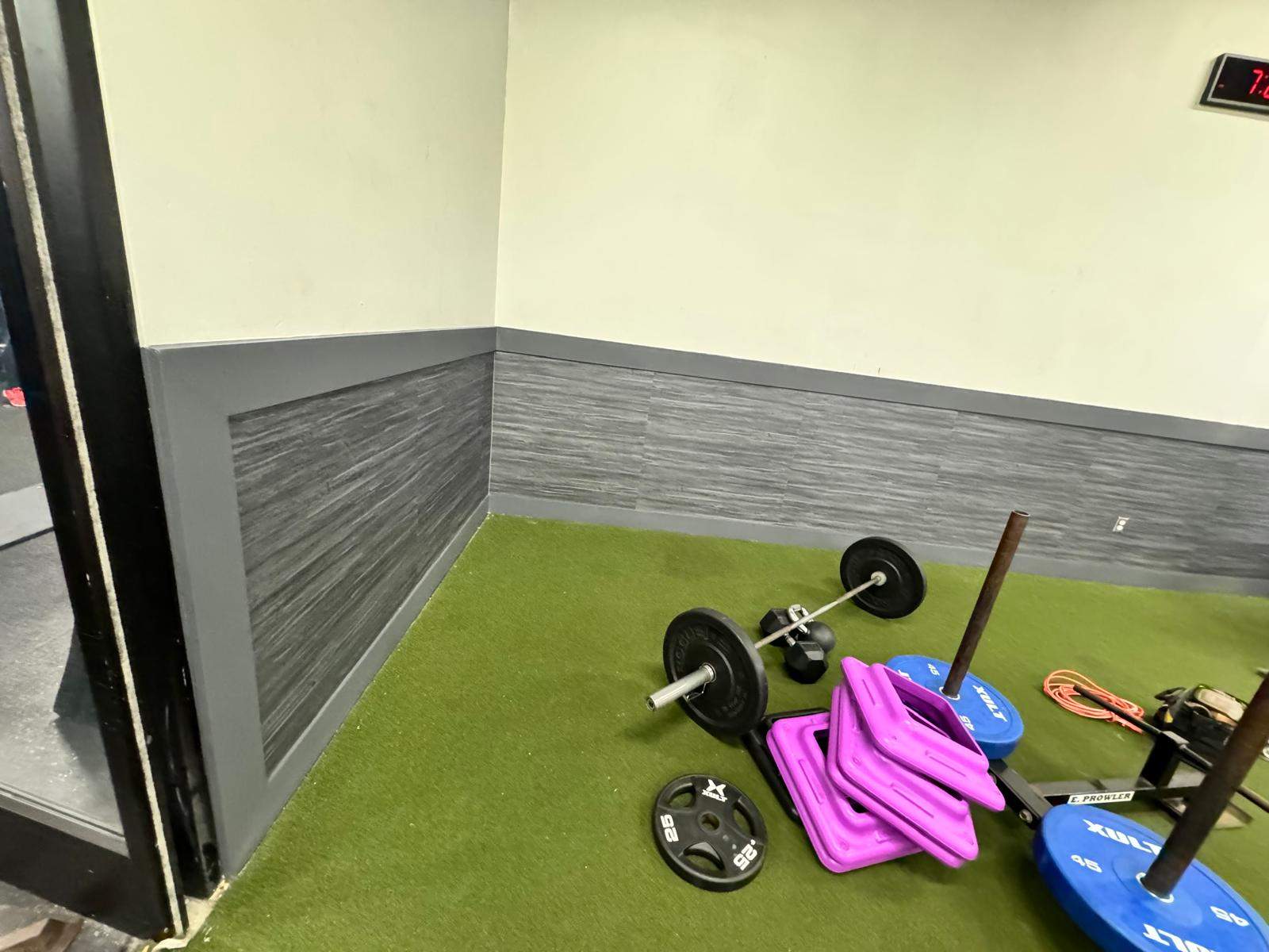 Burke OLF - Wall protection and rubber monster tiles installation by Nova HomeWorks 