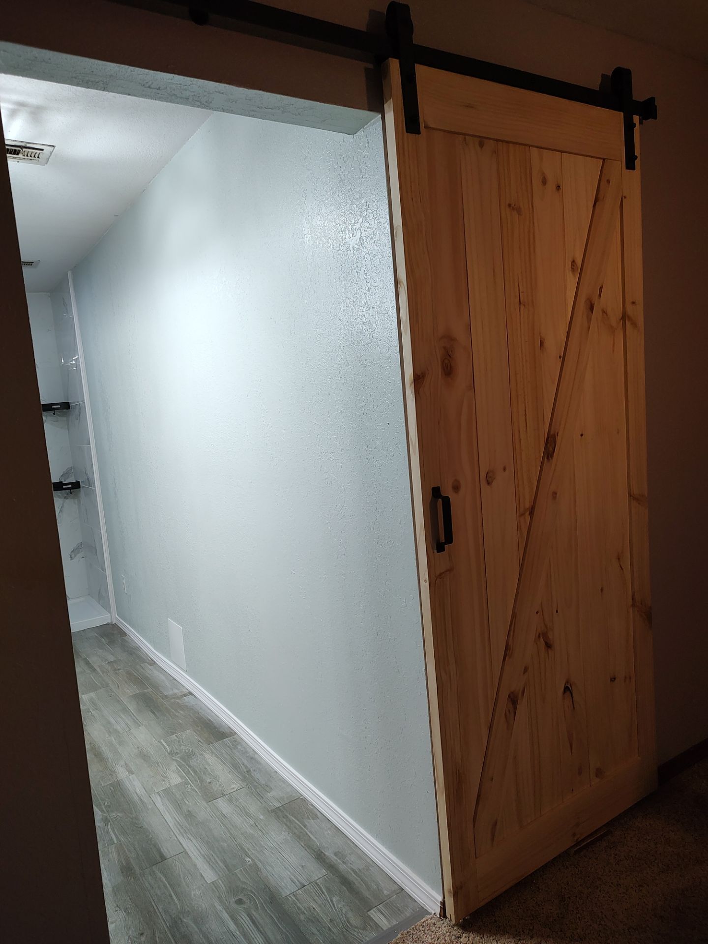 Bathroom remodel w/shower upgrade by In & Out Construction & Remodeling, LLC