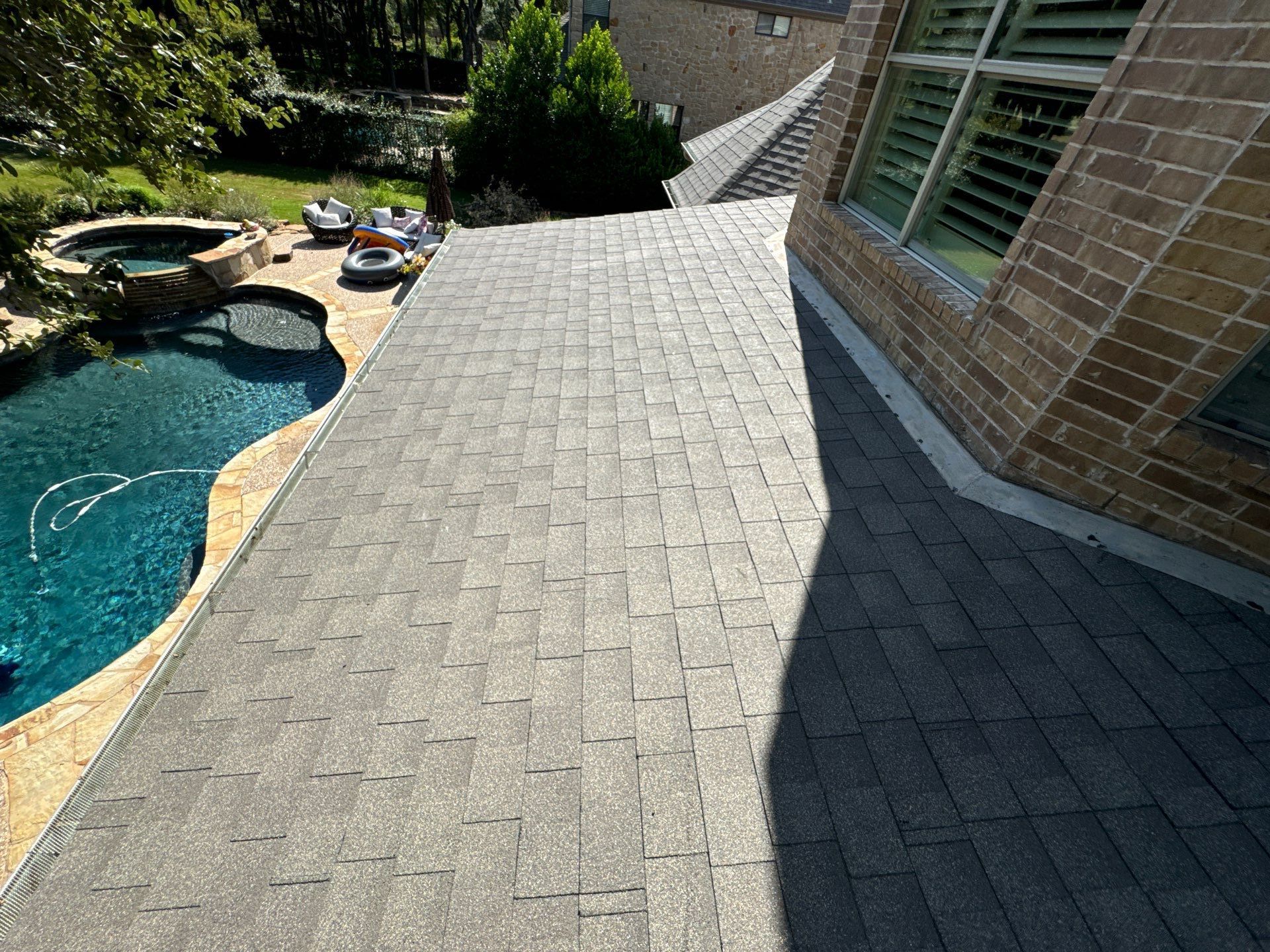 Residential Roofing Installation using IKO, Cambridge in Weathered Wood by Oakwood Roofing and Construction, LLC