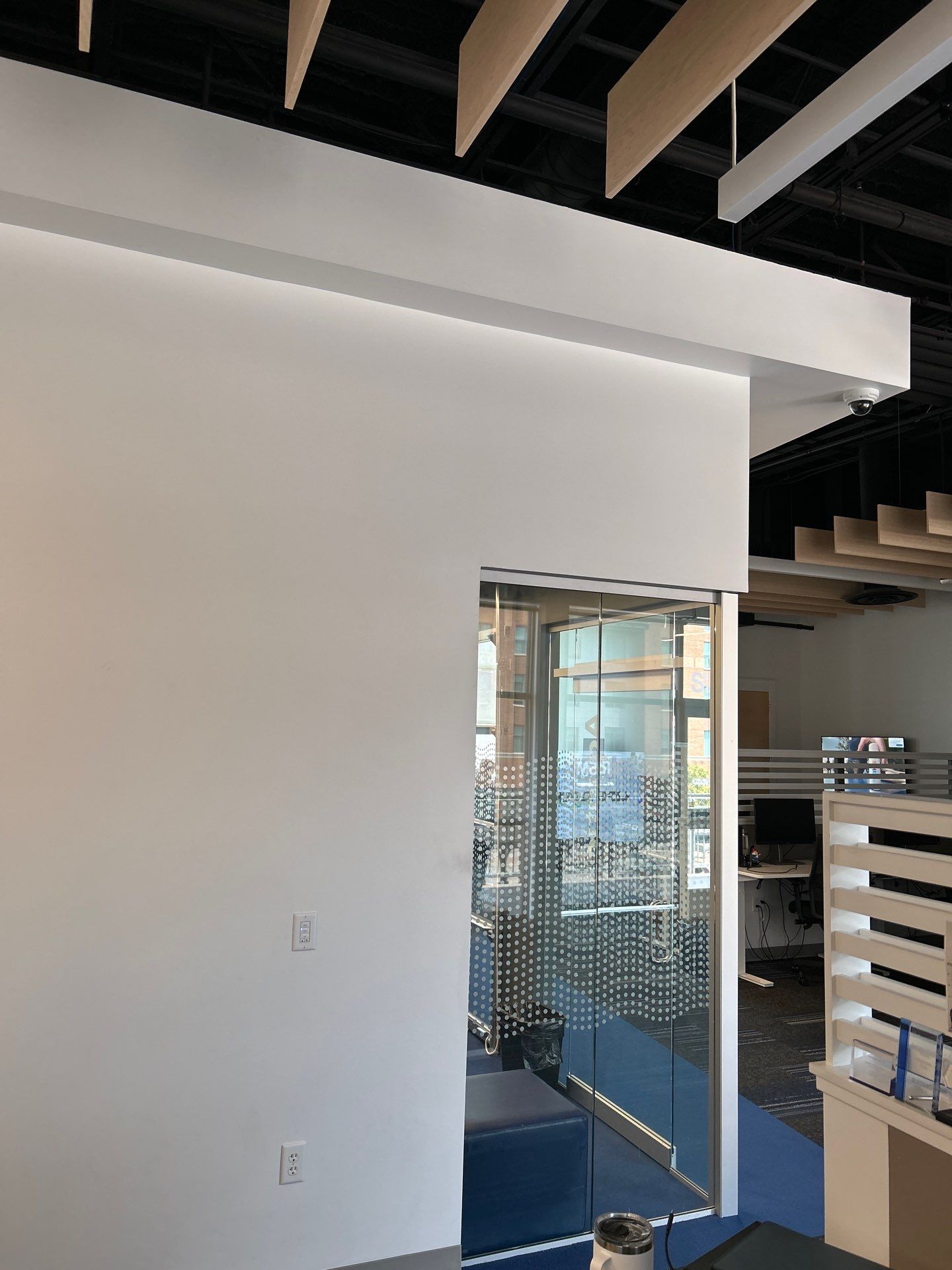 Office Remodel Featuring Acoustic Baffles and Professional Carpet Installation by CompanyCam Sales Demo