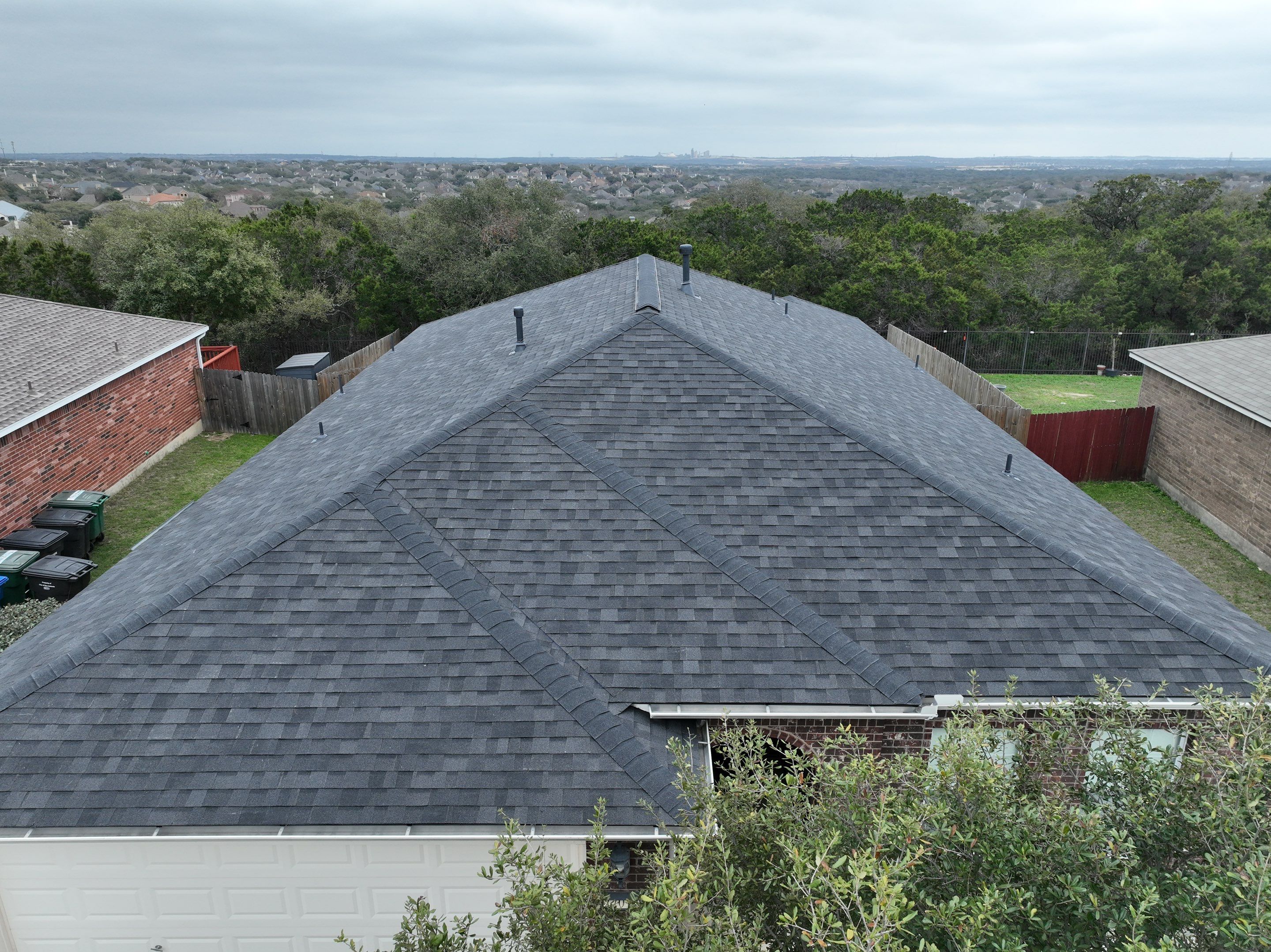 Residential Roof Replacement using 30 Year Laminate Shingles with High Profile Ridge by Premier Roofing and Contracting