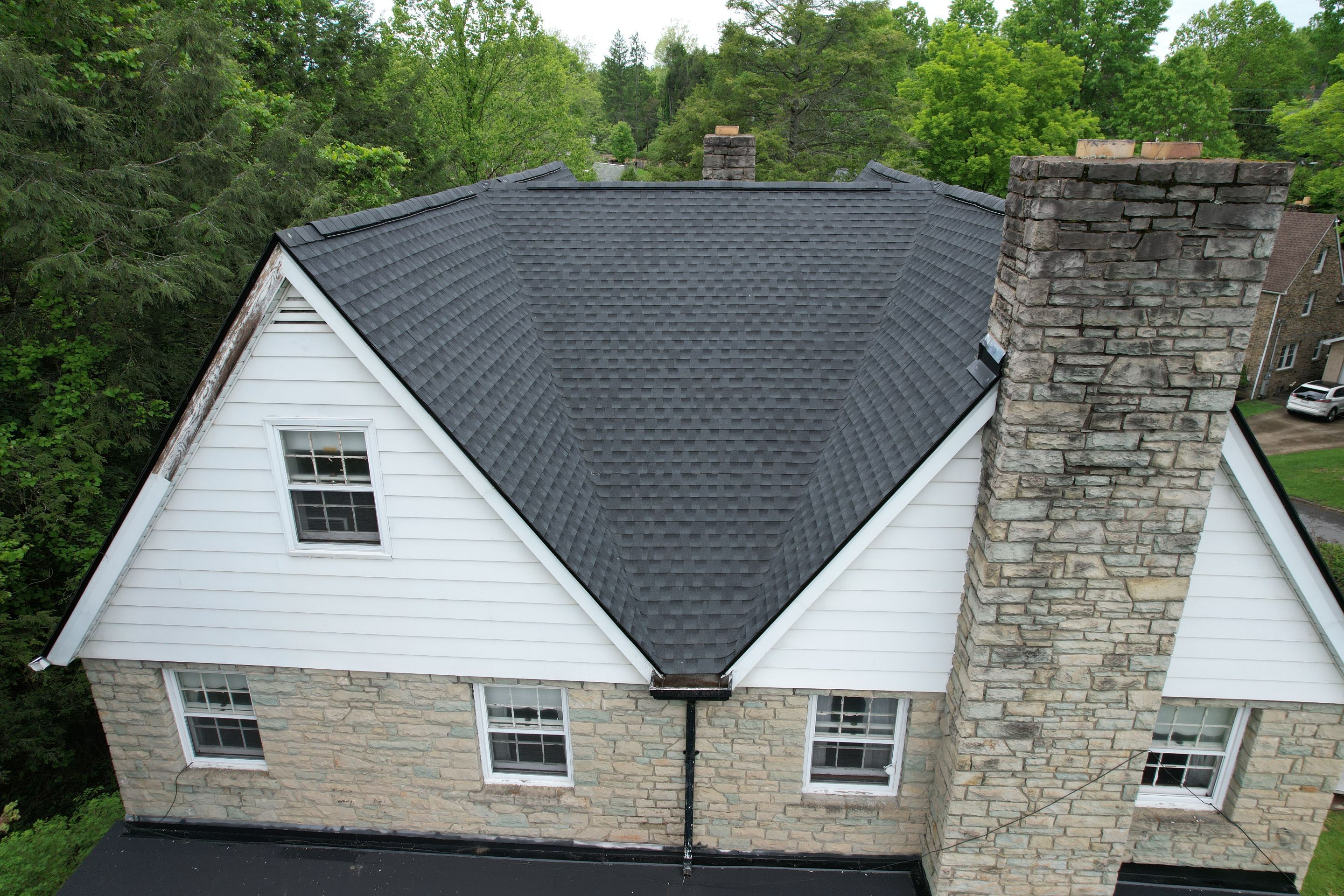 Residential Roofing Installation using GAF Timberline HDZ Charcoal by Rainstoppers Roofing