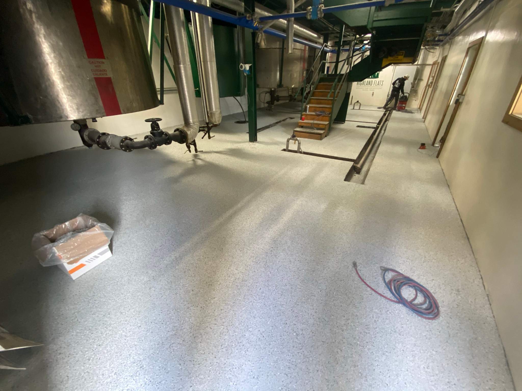 Commercial Floor Transformation using North Pole with Green by Croc Coatings, LLC