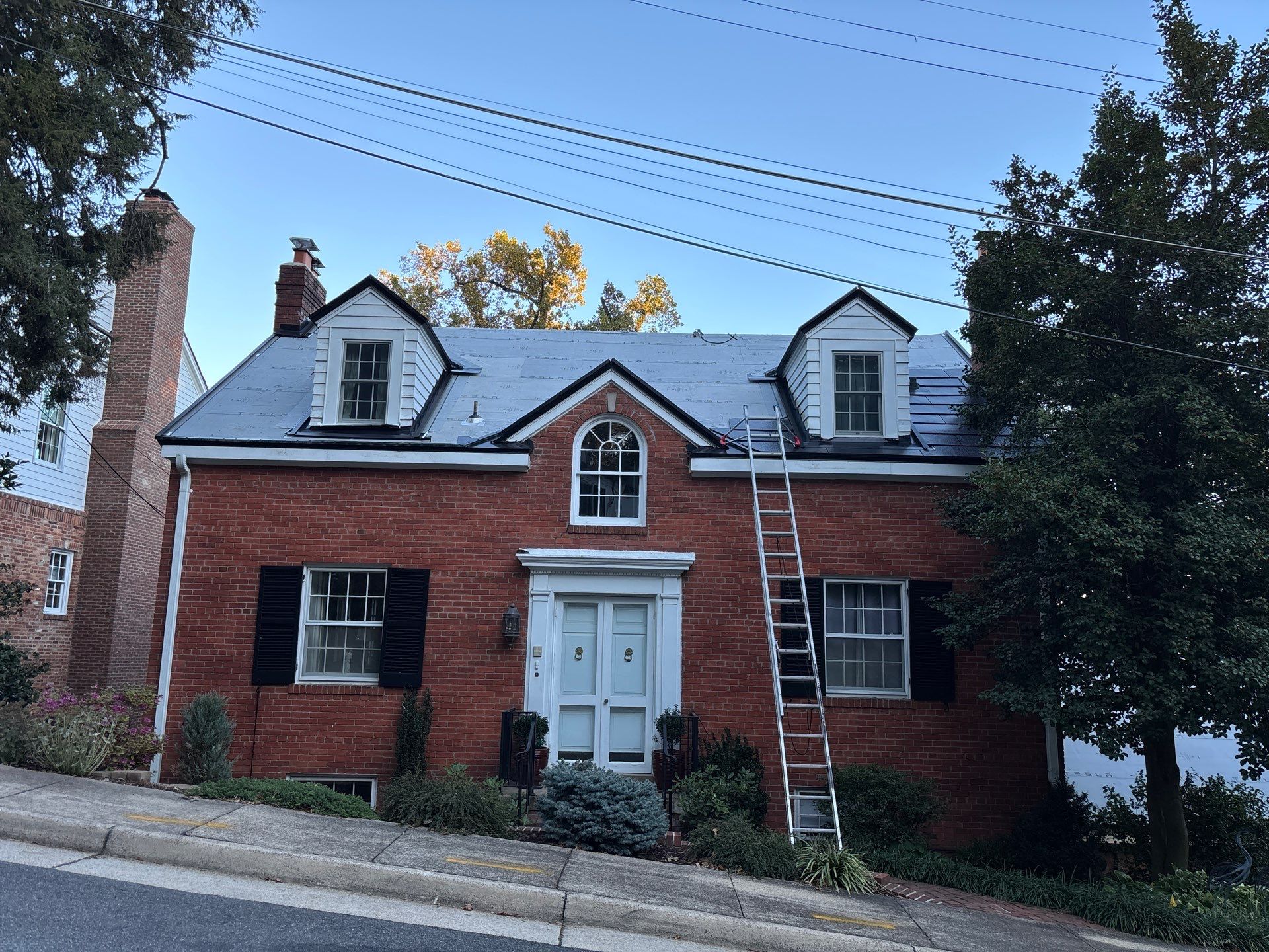 Sleek Tesla Solar Roof + Powerwall Installation | Alexandria, VA by American Home Contractors