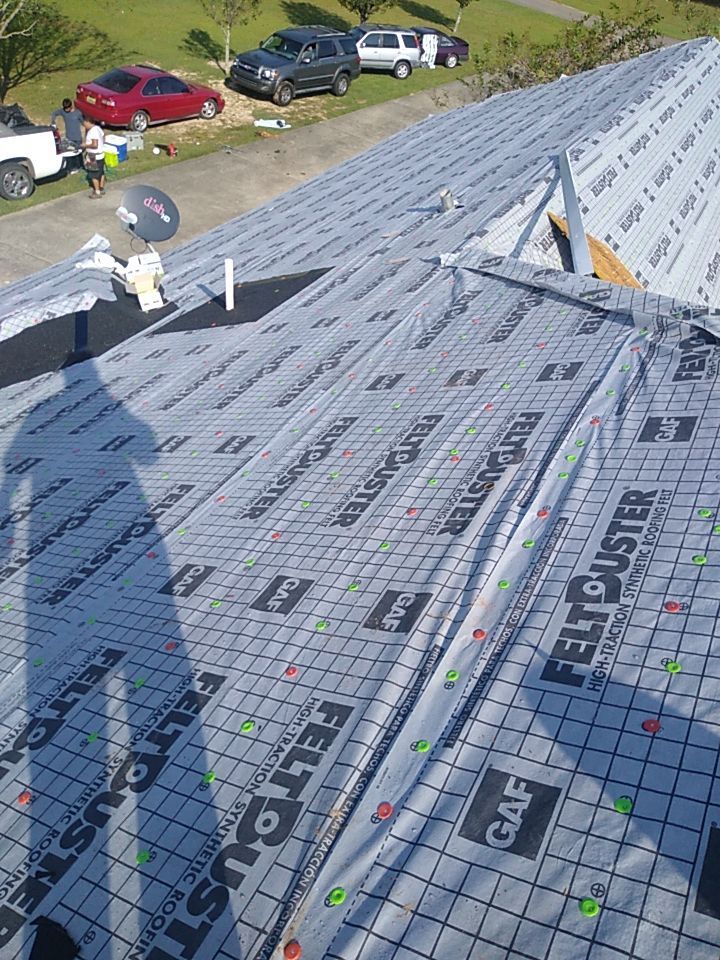 Residential Roofing Installation using Roof Replacement by American Roofing & Construction LLC