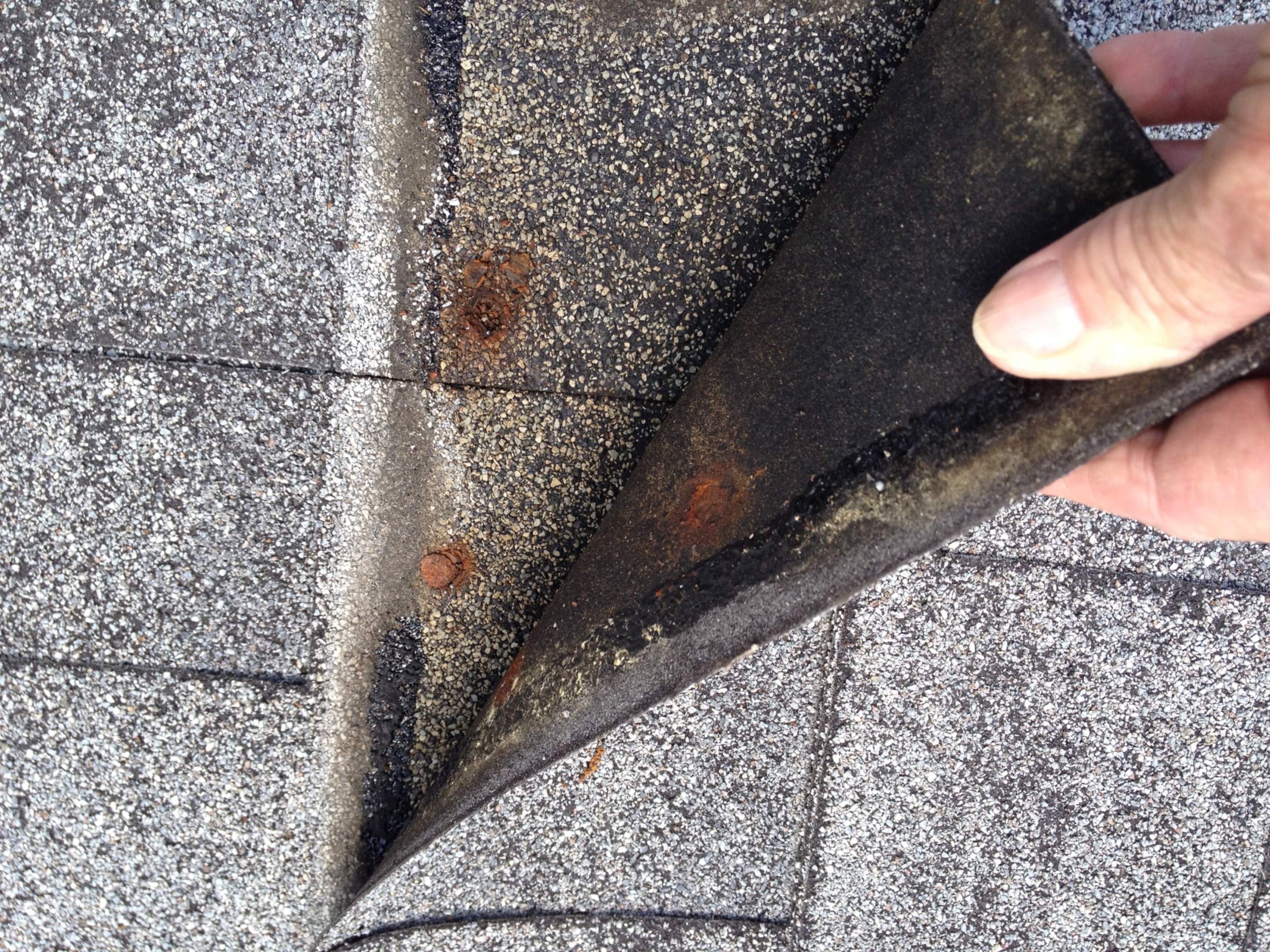 Residential Roof Repair Addressing Rusted Fasteners in Indialantic by Florida Roofing and Renovations Inc.