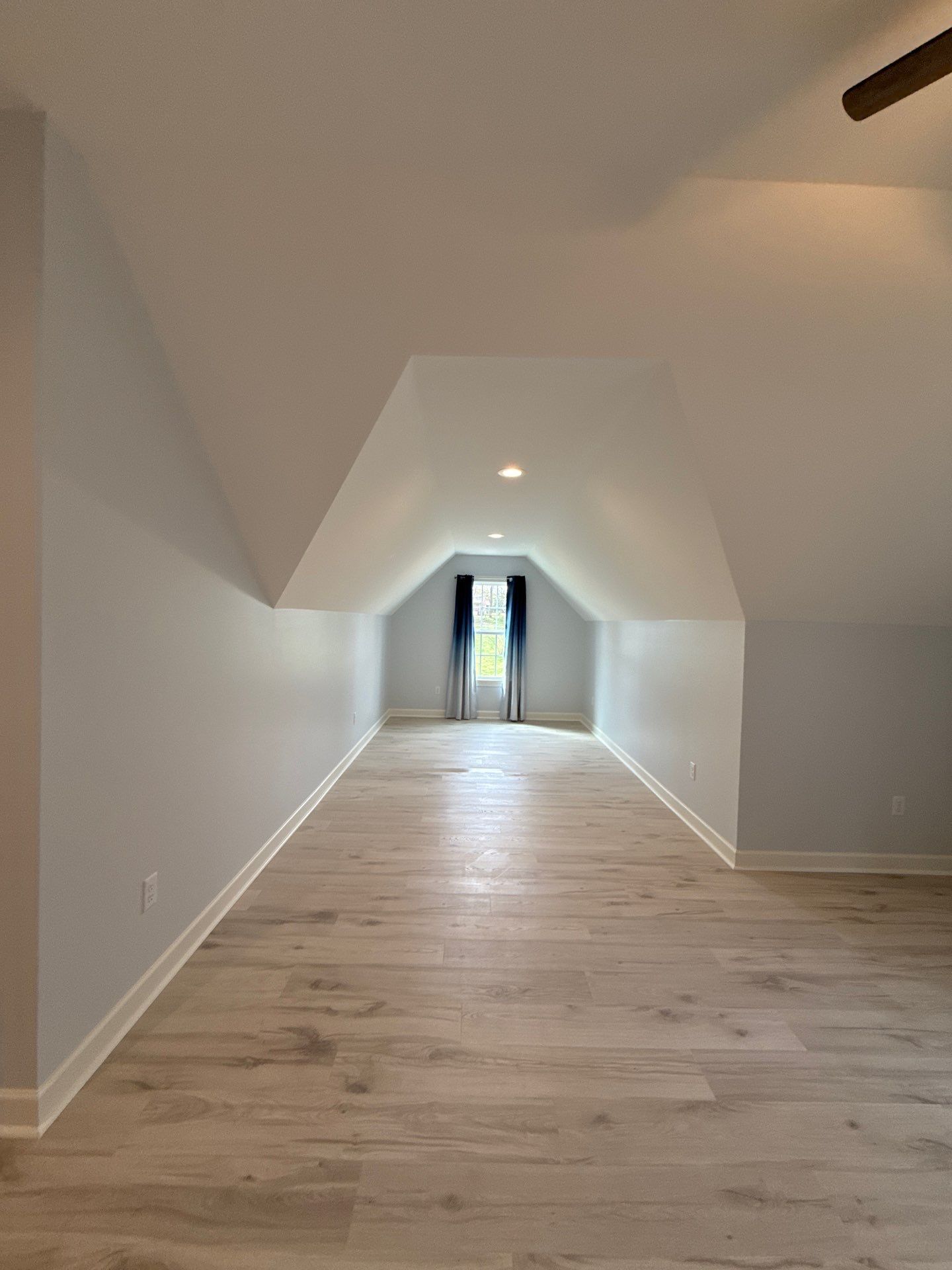 Attic Conversion by Skilled Construction LLC