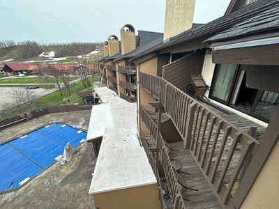 Gutter and Gutter Helmet Installation for Harbor Springs Hotel