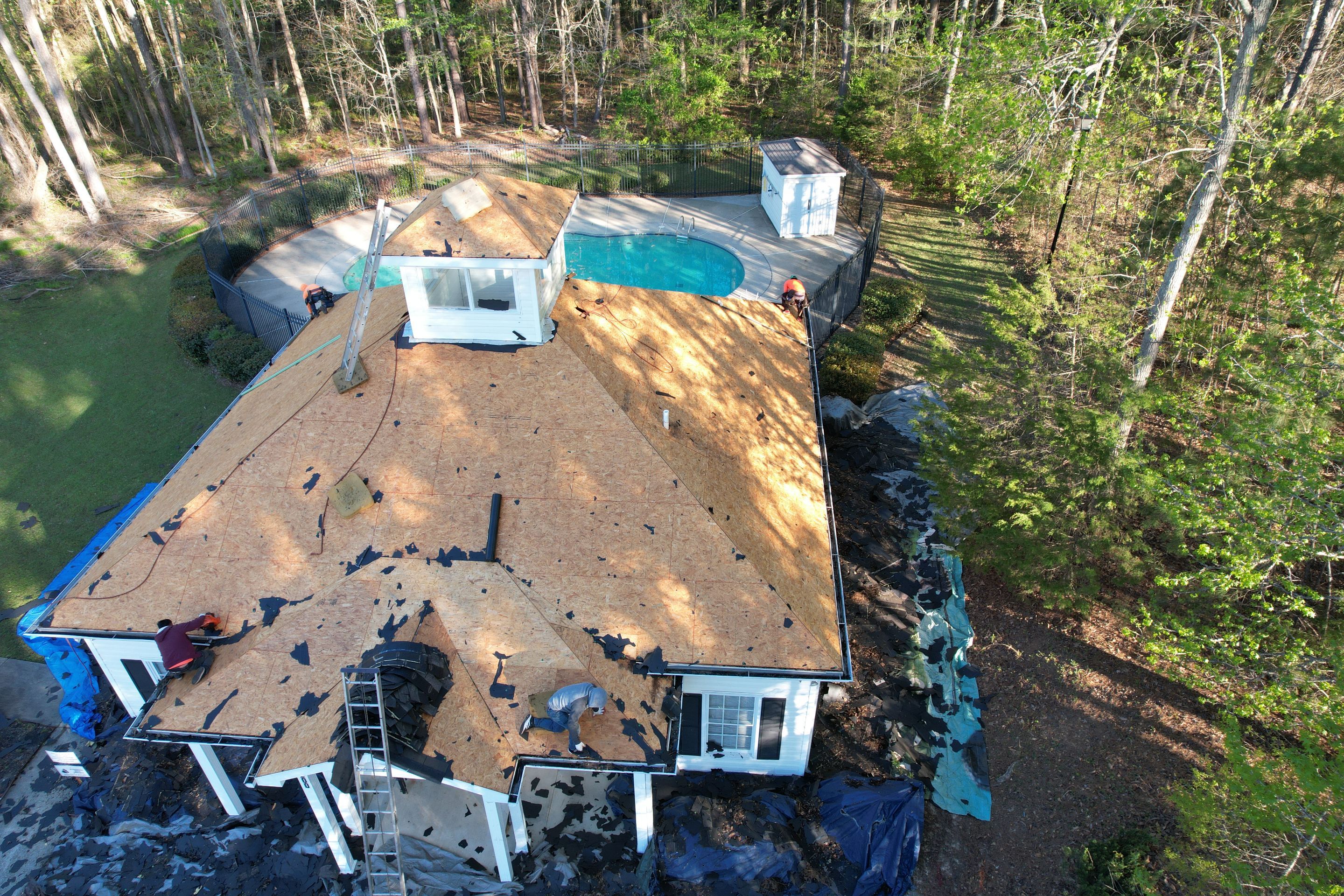 Pool House Roof Replacement using Owens Corning Onyx Black by Inspector Roofing and Restoration