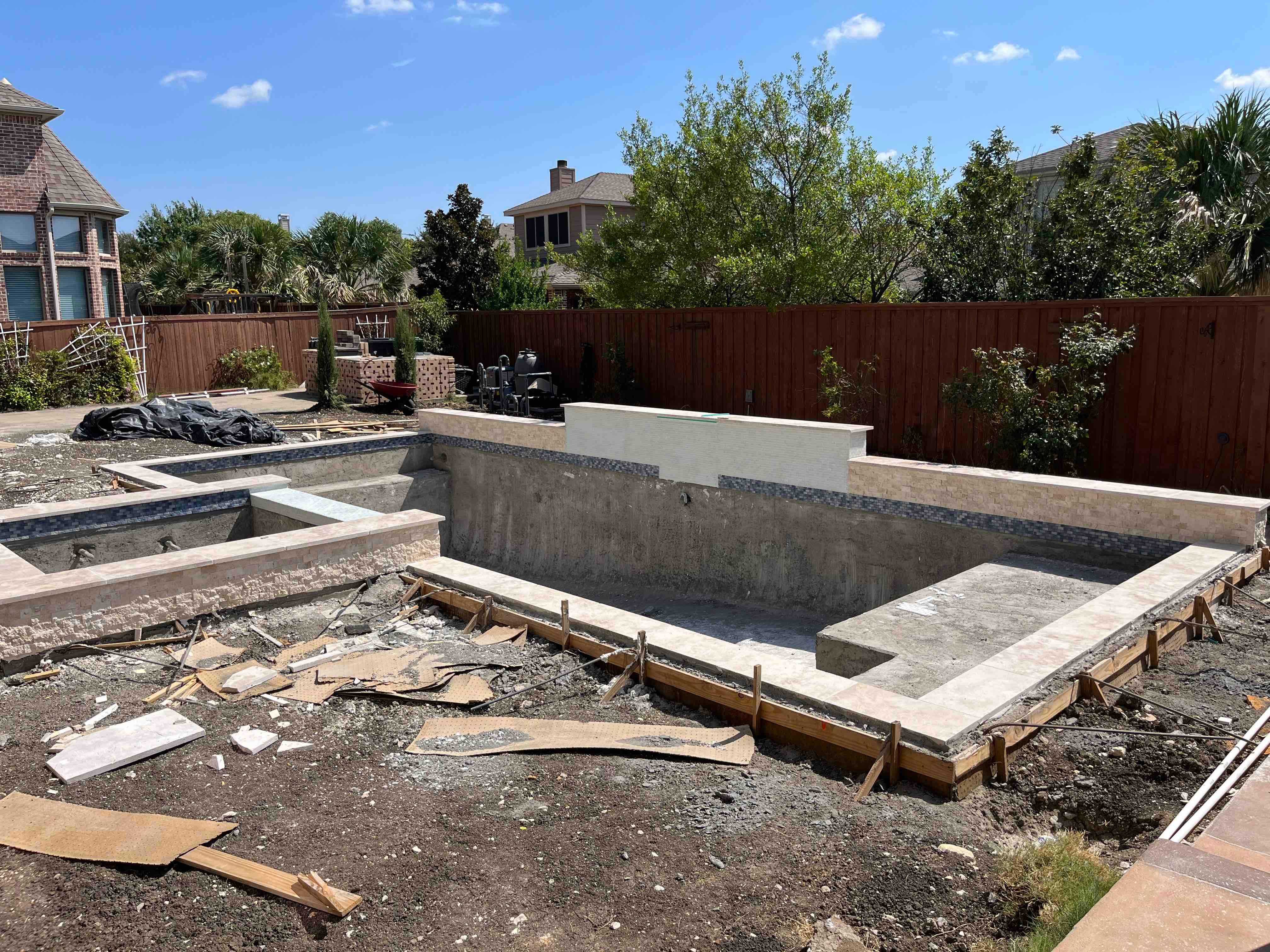 Geometric Pool with Raised Spa and Tanning Ledge by Pinnacle Pools and Spas - DFW