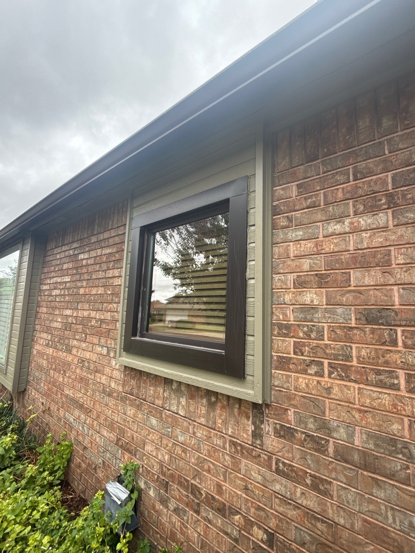 Gutter installations and exterior painting by McCann's Roofing and Construction