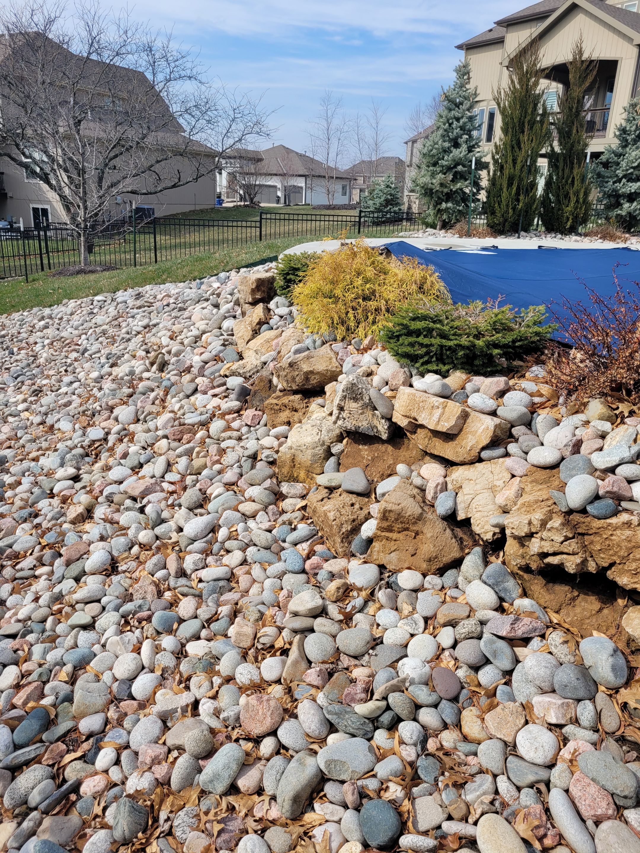 Pool Retaining Wall by LAND ESCAPES LLC