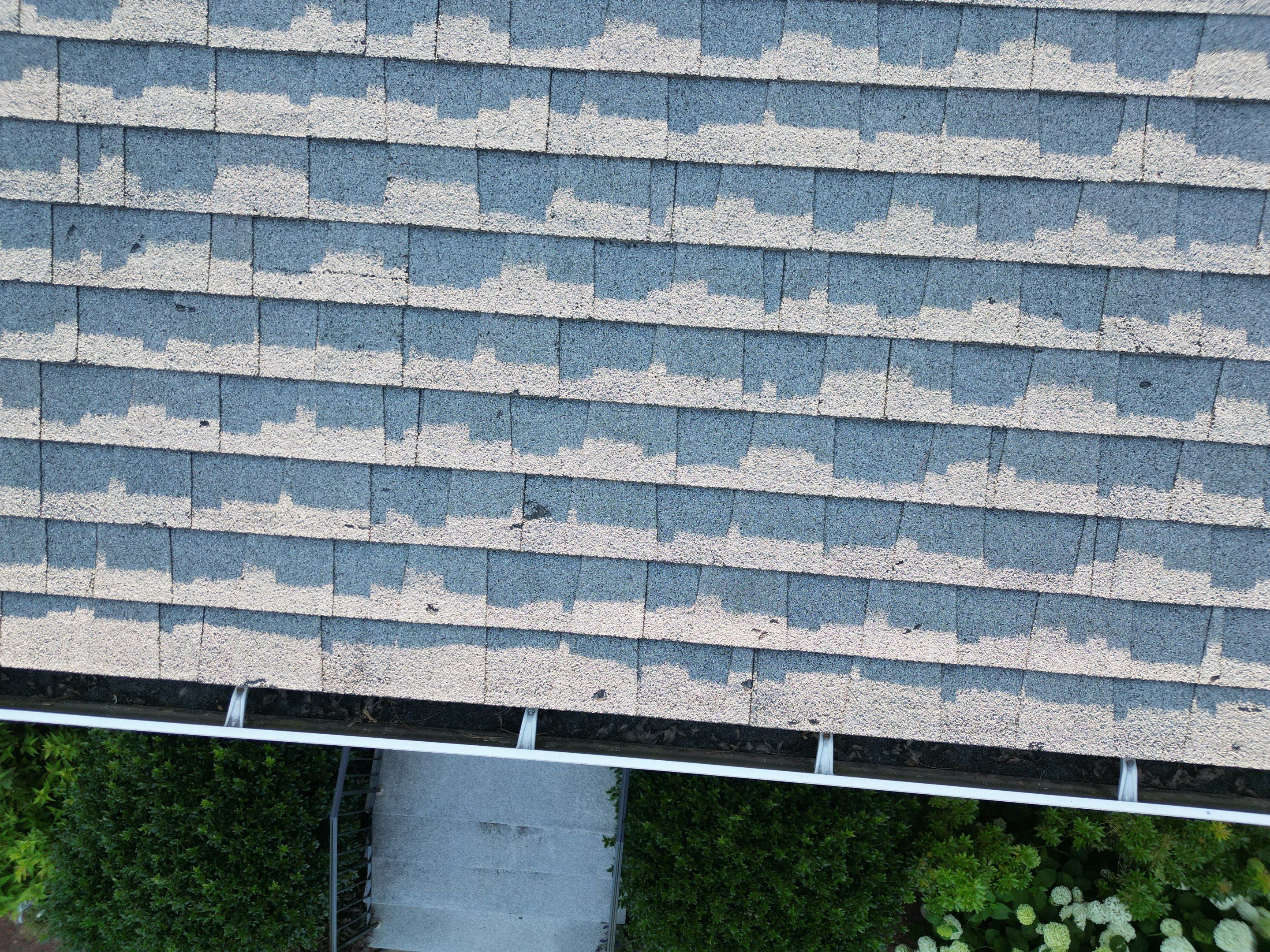 Complete Roof Replacement with Chimney Flashing, Gutter Guard System, and Vinyl Siding Repairs by Mighty Dog Roofing of Greater Middlesex County