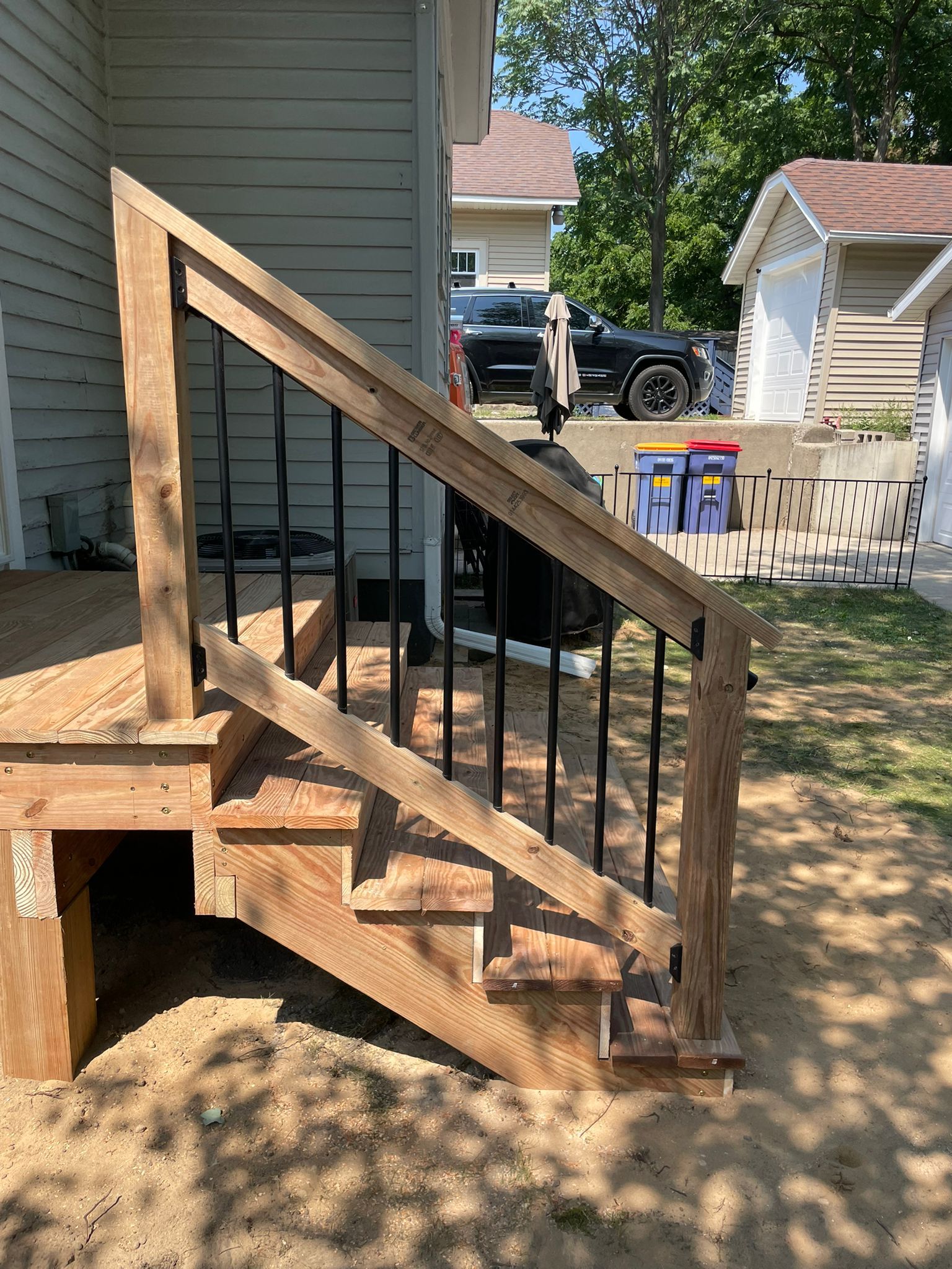 Patio Slider Door and Rear Deck  by Avalon Roofing and Exteriors