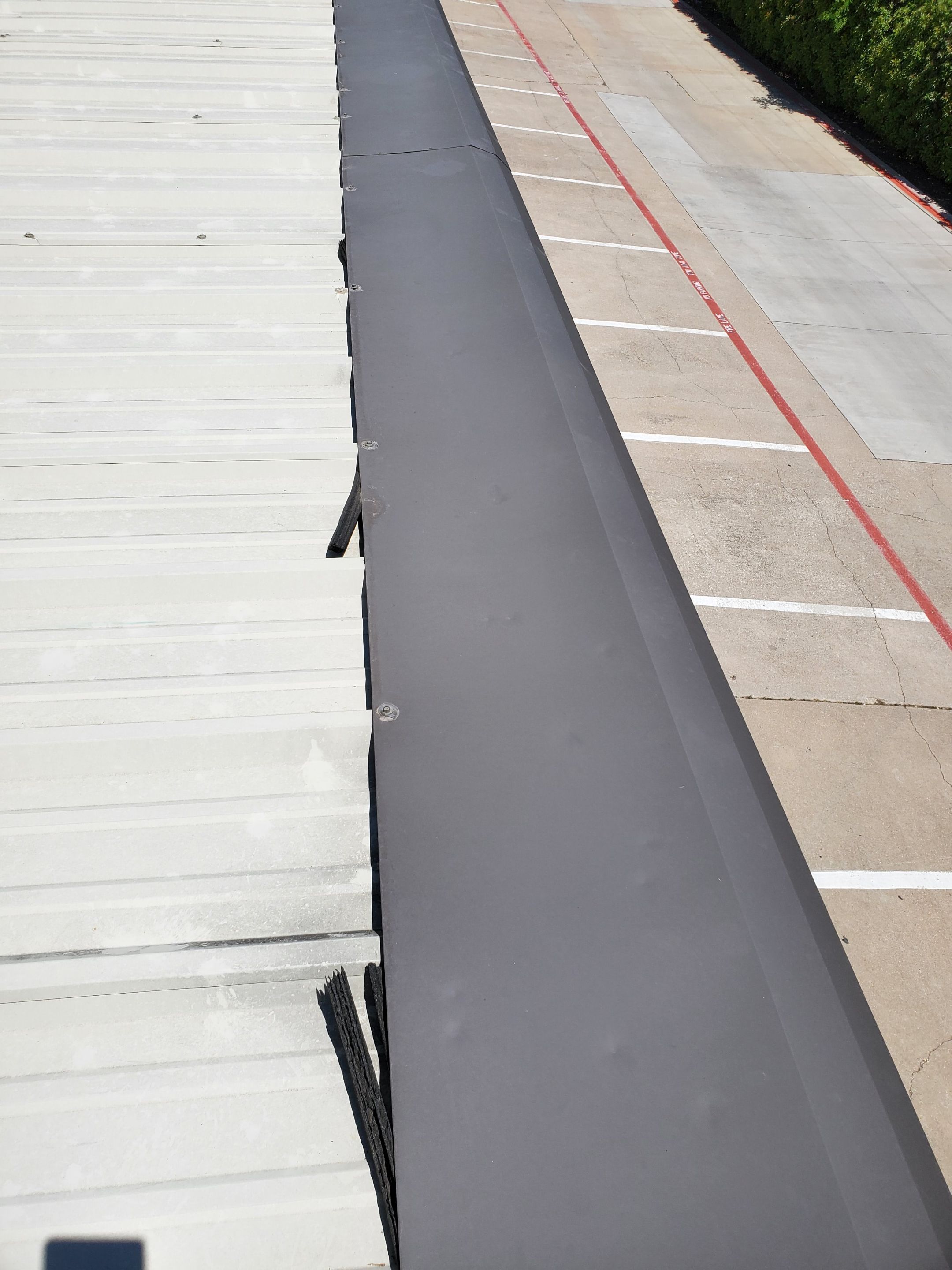 Commercial Roofing Installation using Double lock Mechanical Standing Seam Metal by Becker Roofing and Exteriors