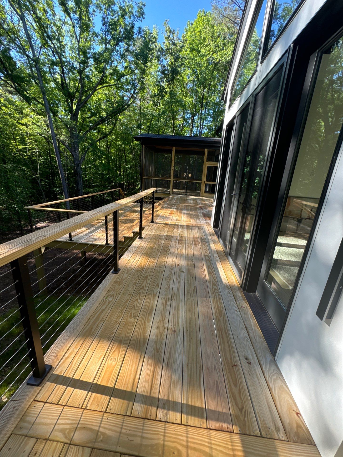 Porch and Deck staining  by GonzalezPainters & Contractors Inc 
