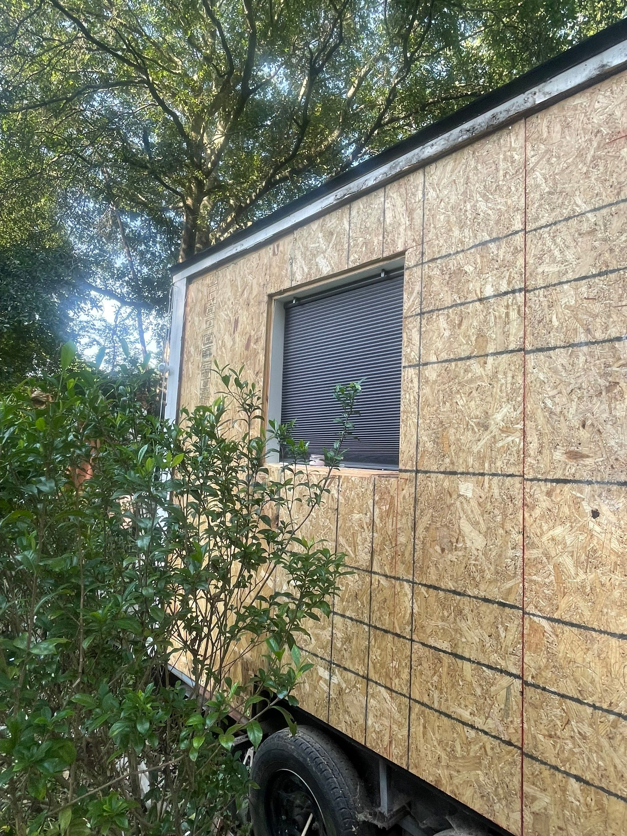 tiny home remodel- siding,paint,roofing by Nailed It Roofing & Remodeling LLC
