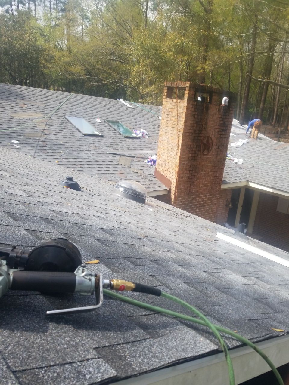 Residential Roofing Installation using Roof Replacement by American Roofing & Construction LLC