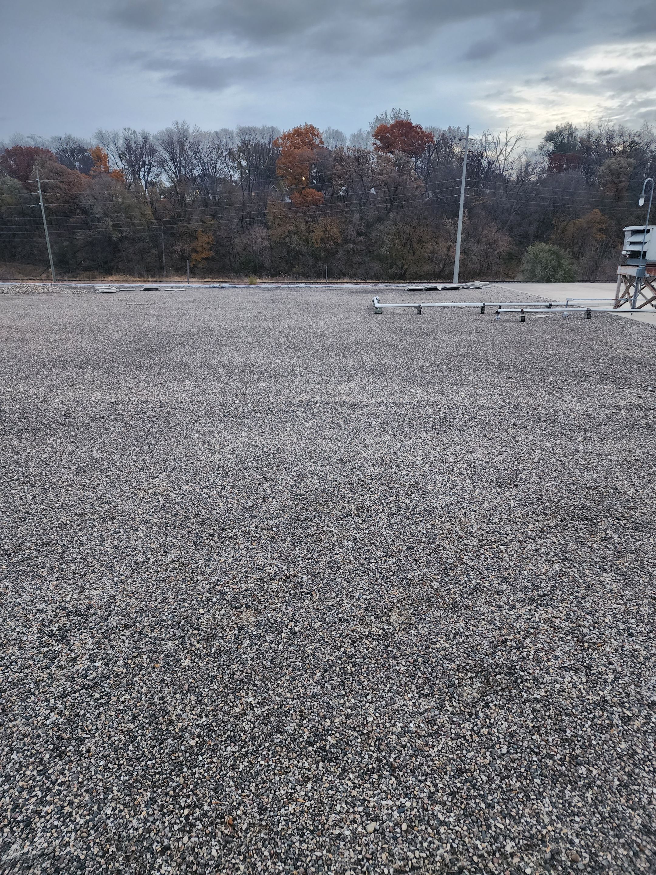 AML Riverside  by Grell Roofing, LLC