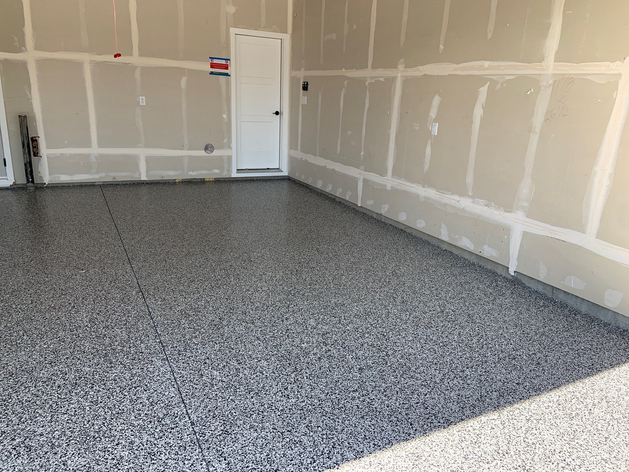 Garage Transformation using Domino by Croc Coatings, LLC