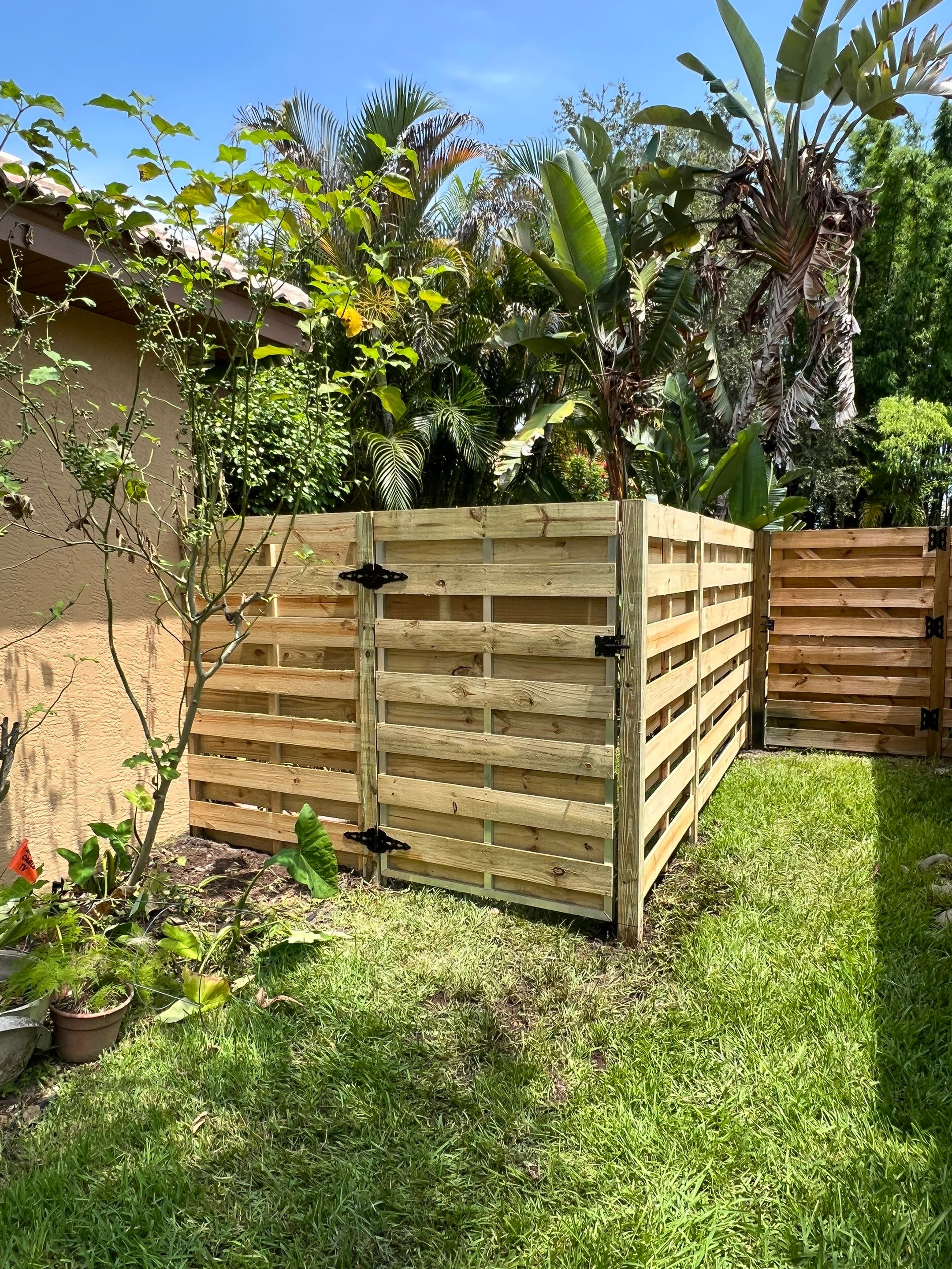 Osprey, FL 6ft. Tall Treated Horizontal Shadowbox Wood Fence by Asap fence and gates, LLC