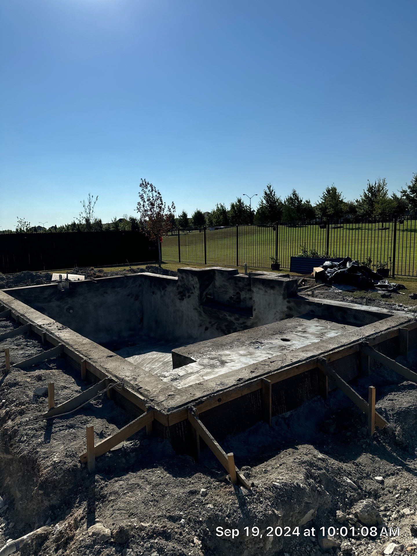 Modern Geometric Pool with Expansive Deck by Pinnacle Pools and Spas - DFW