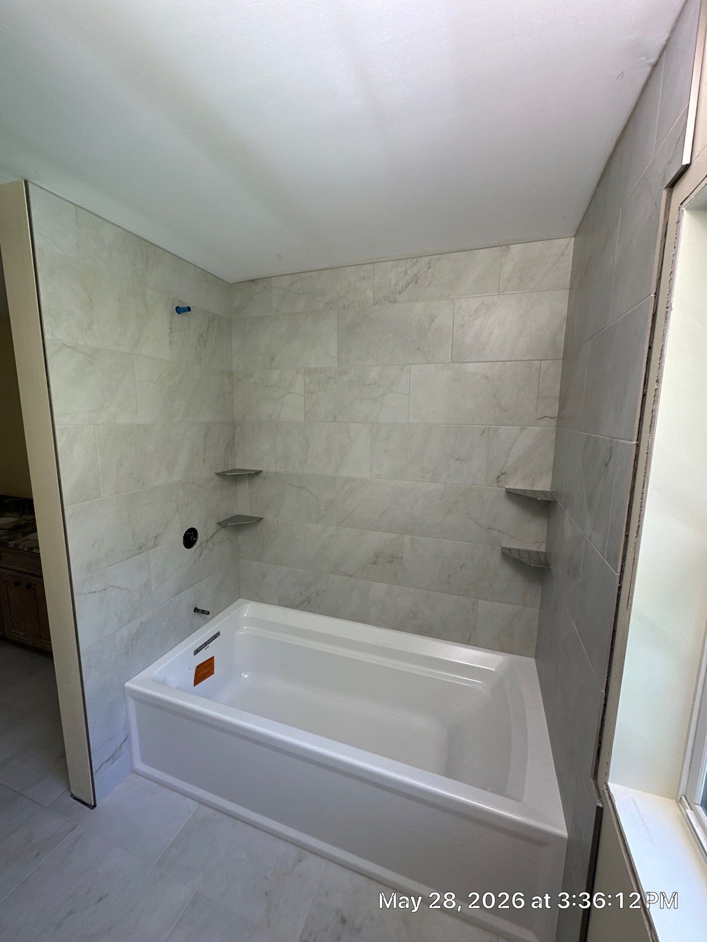 Bathroom Tile by Renovatic LLC