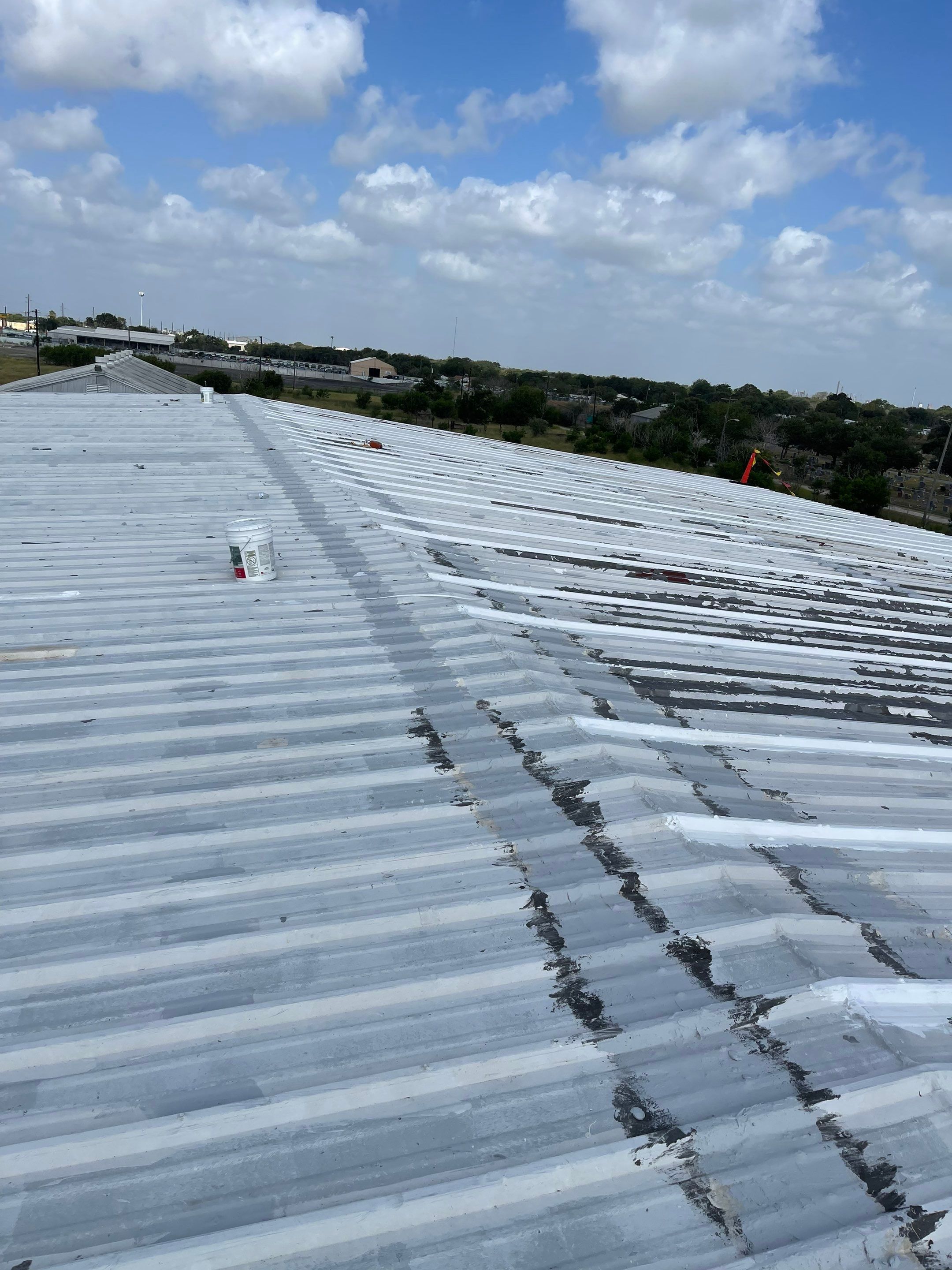 Commercial Roofing Installation using GAF 10 Year Acrylic System by Lighthouse Roofing