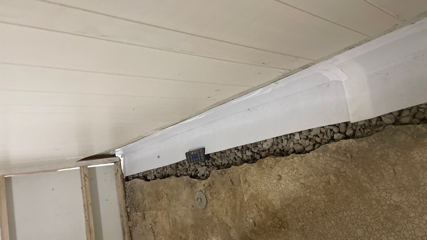Interior Waterproofing Using GrateDrain™ Products by Toledo Basement Repair