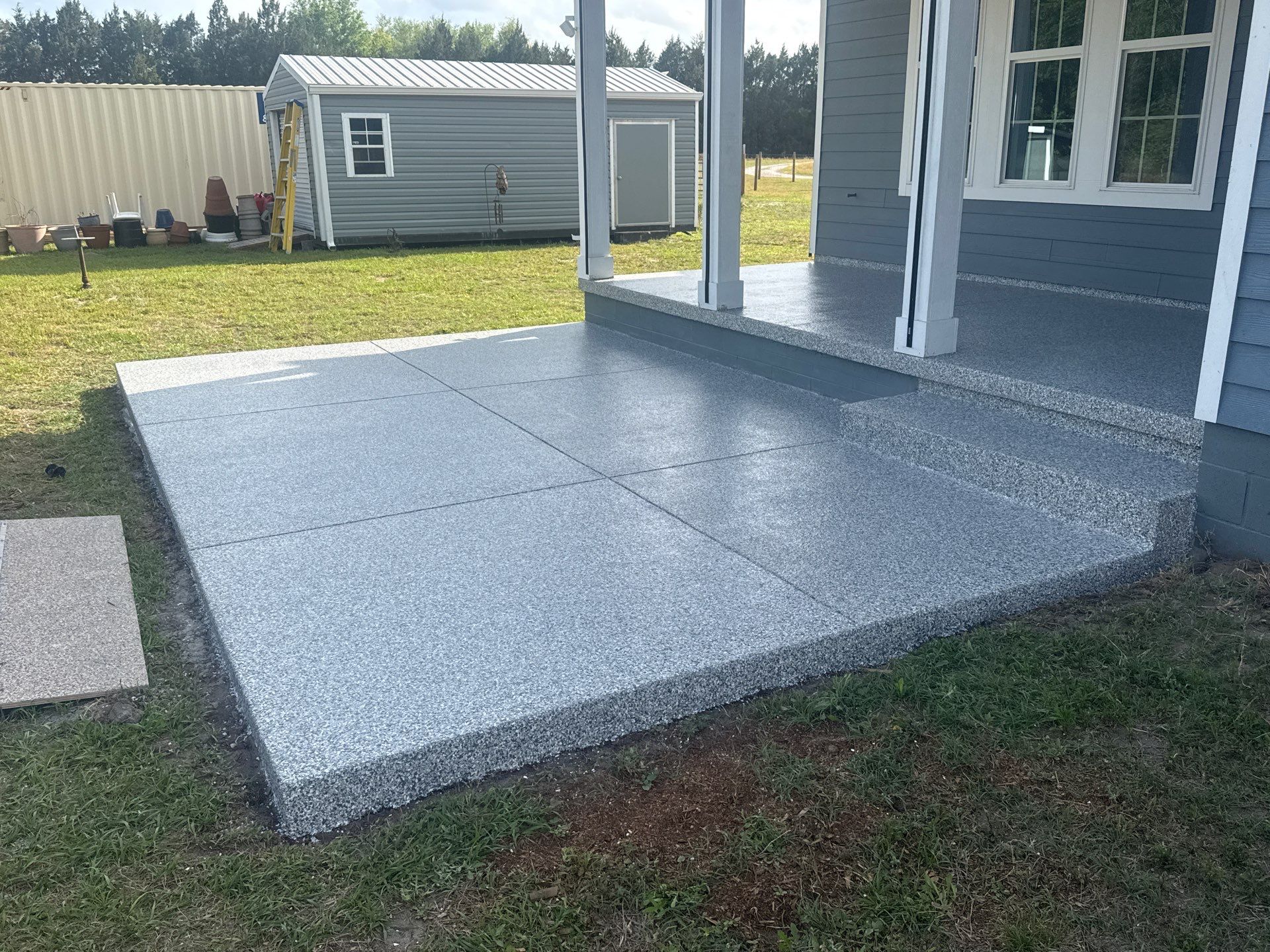 Back Patio in Slate Stone by Cross Creek Concrete Coatings