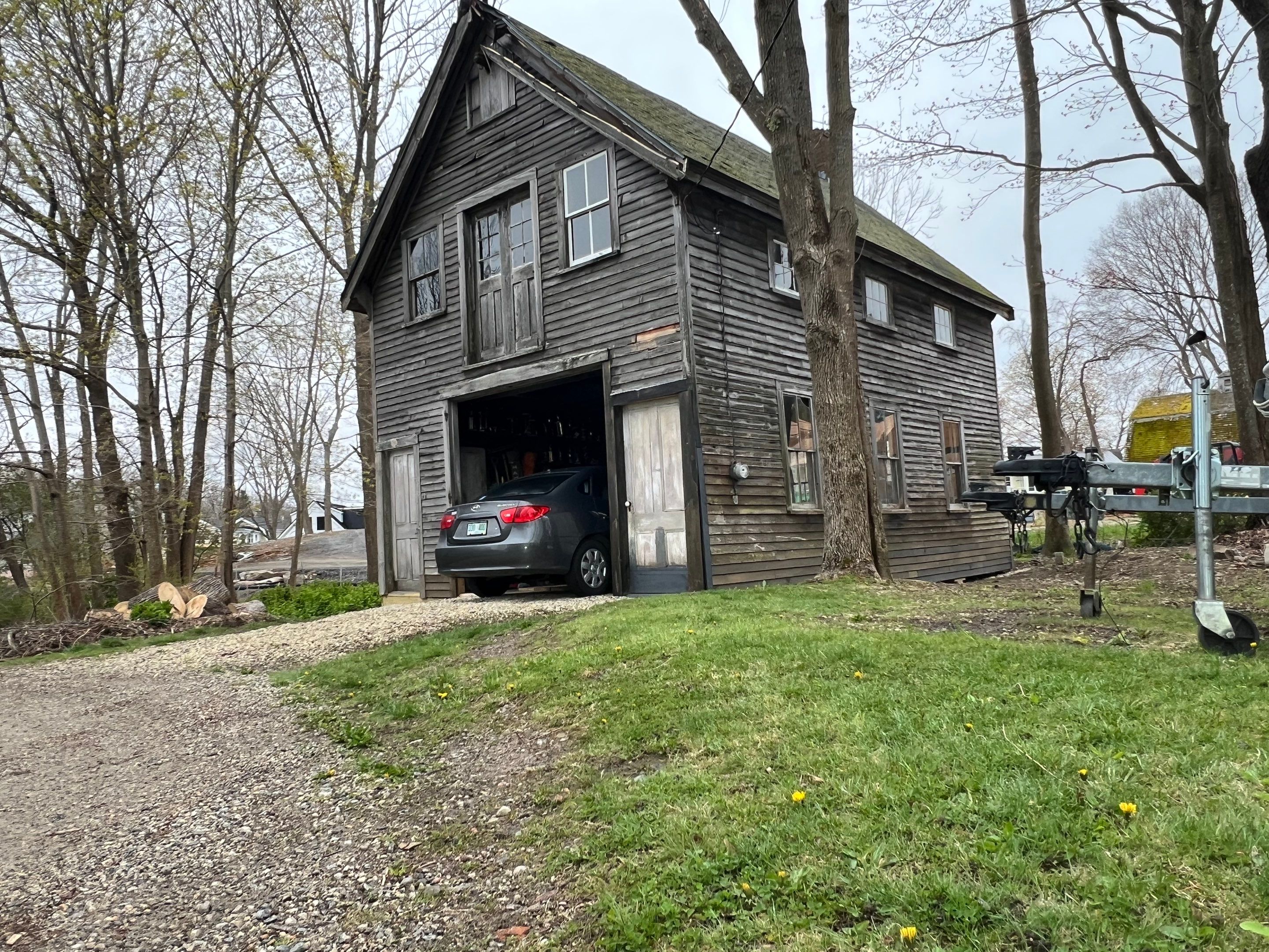 Just the beginning of a barn restoration in New Castle by Tall pine roofing