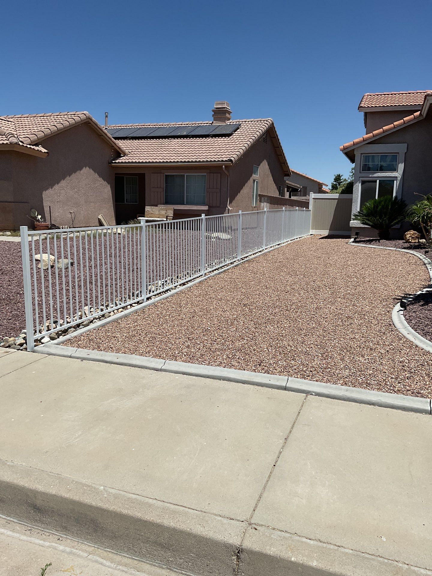 Fence Installation using Wrought Iron by Fence Guys Inc. 
