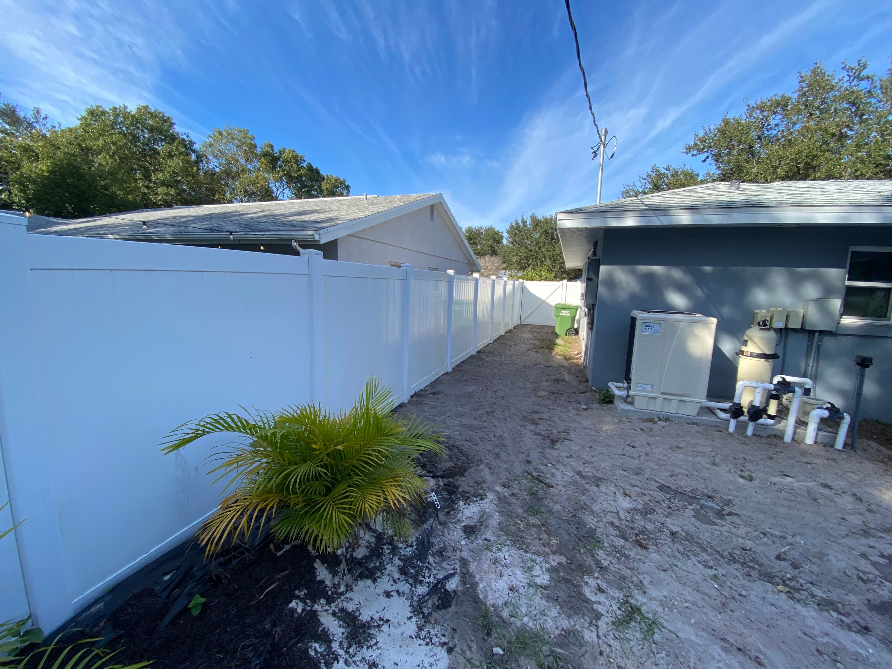 Vinyl Privacy Fence With AC Enclosure and Storage Corral by Asap fence and gates, LLC