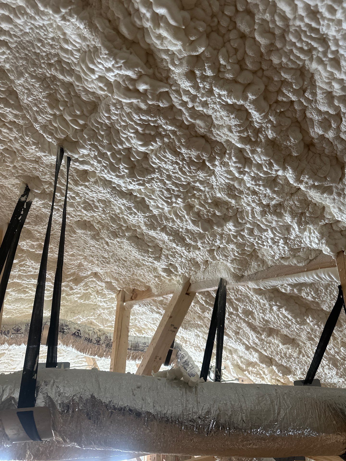 Open cell spray foam & rockwool job completed in Dallas TX by Apex Insulation Solutions