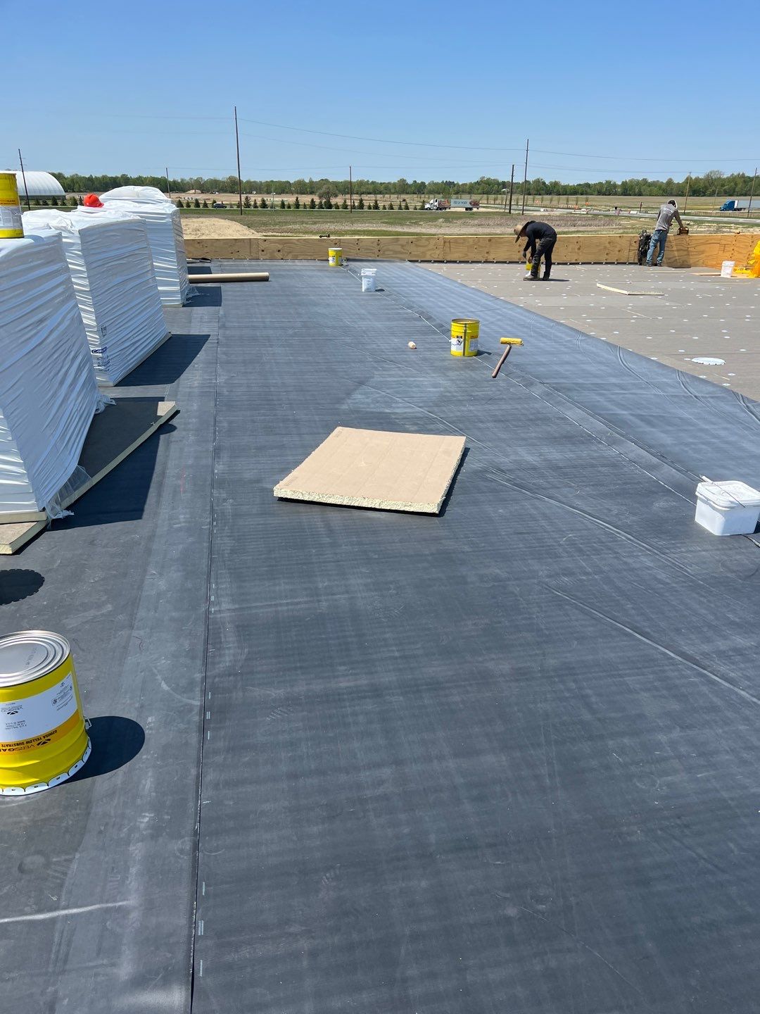 Commercial Roofing Installation using 60 mil rubber roof  by Nitro Roofing and Construction