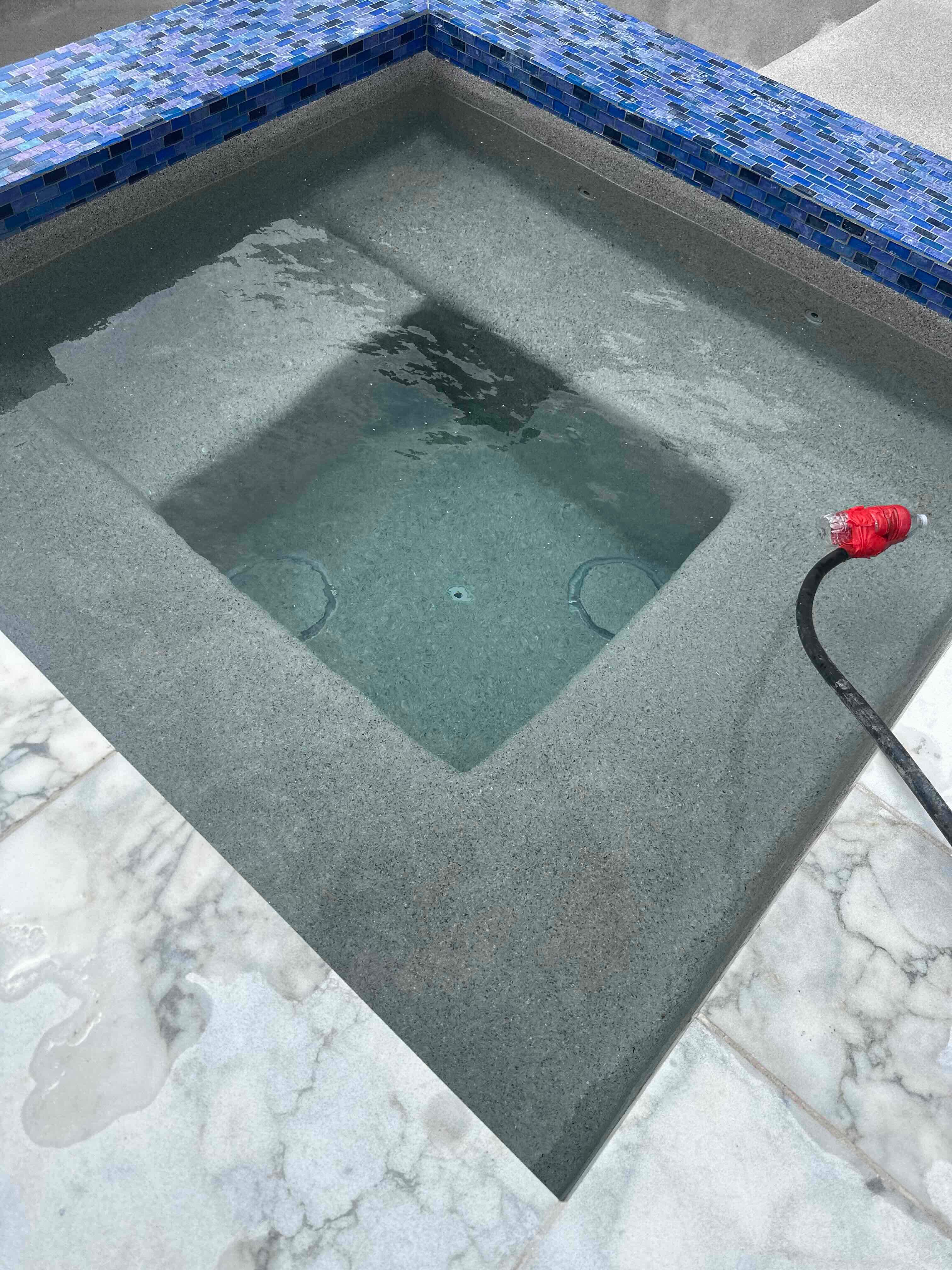 Geometric Pool with Raised Spa and Blue Glass Tile by Pinnacle Pools and Spas - DFW