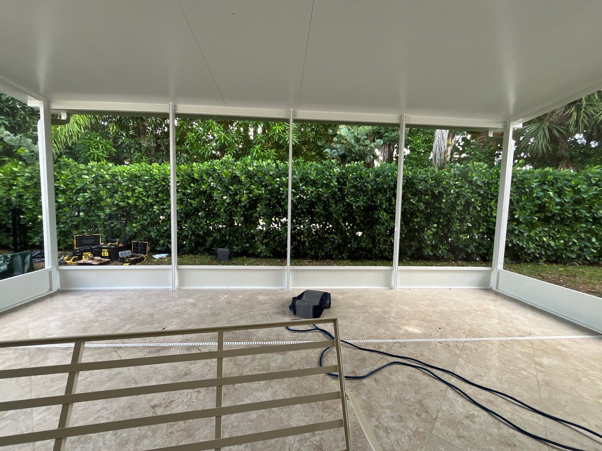 Aluminum Insulated Roof and Screen Enclosure Installation in Atlantis by The Screen Depot, Inc