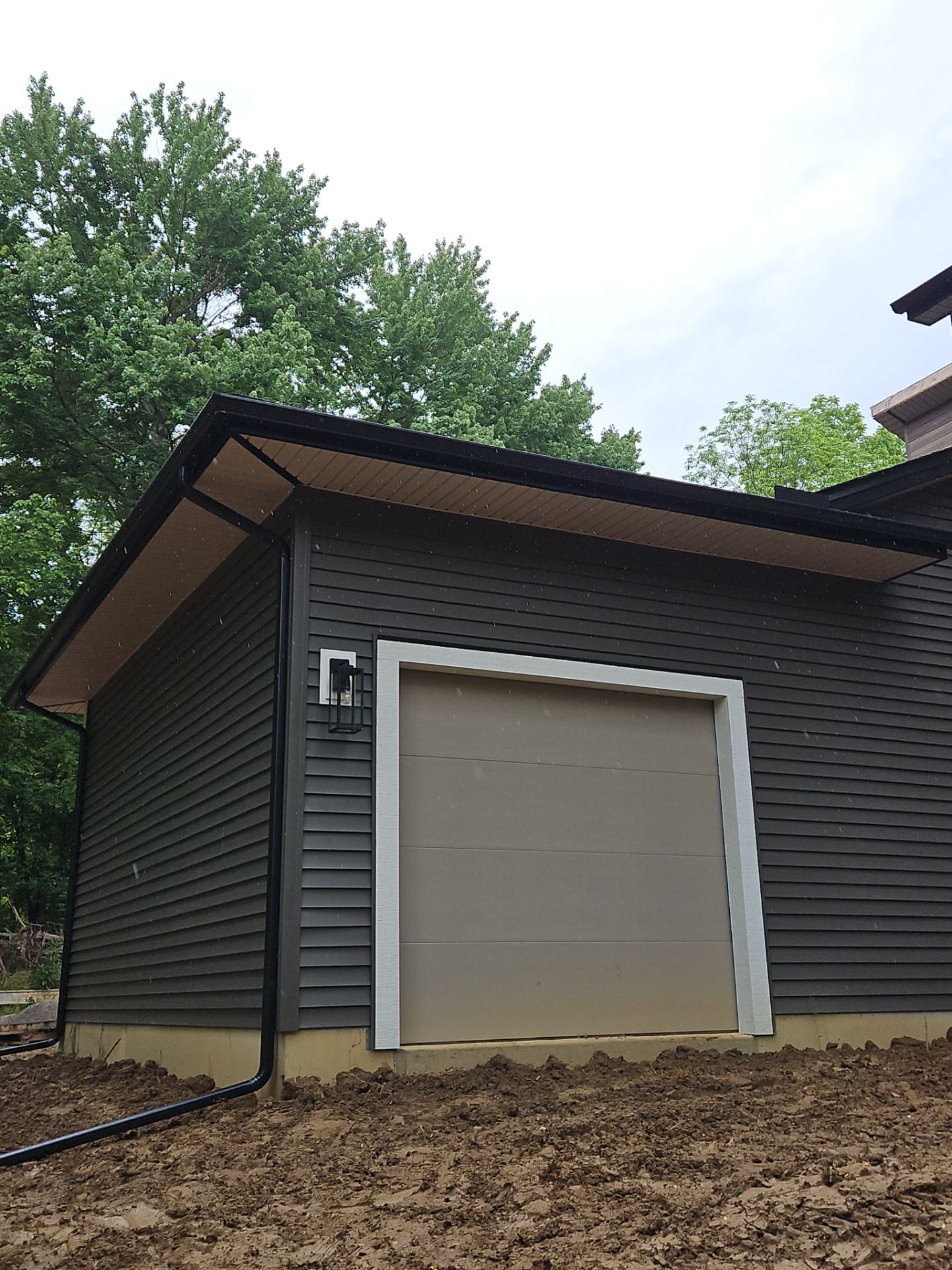 Gutter Installation using 5" Seamless Gutters and Downspouts by RoofX 