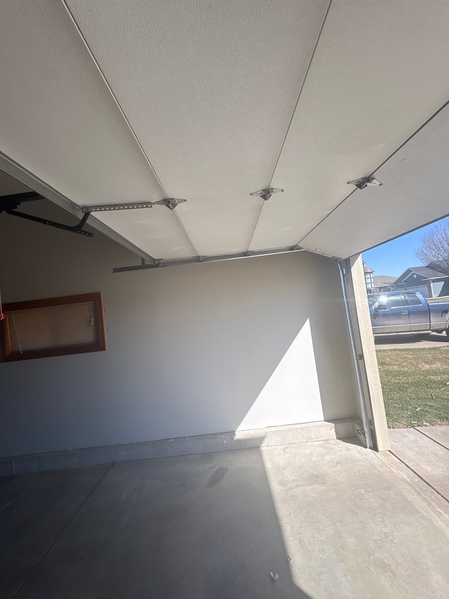 Residential Garage Interior Painting and Drywall Repair in Tea by Select Painting, Coatings & Garage Cabinets