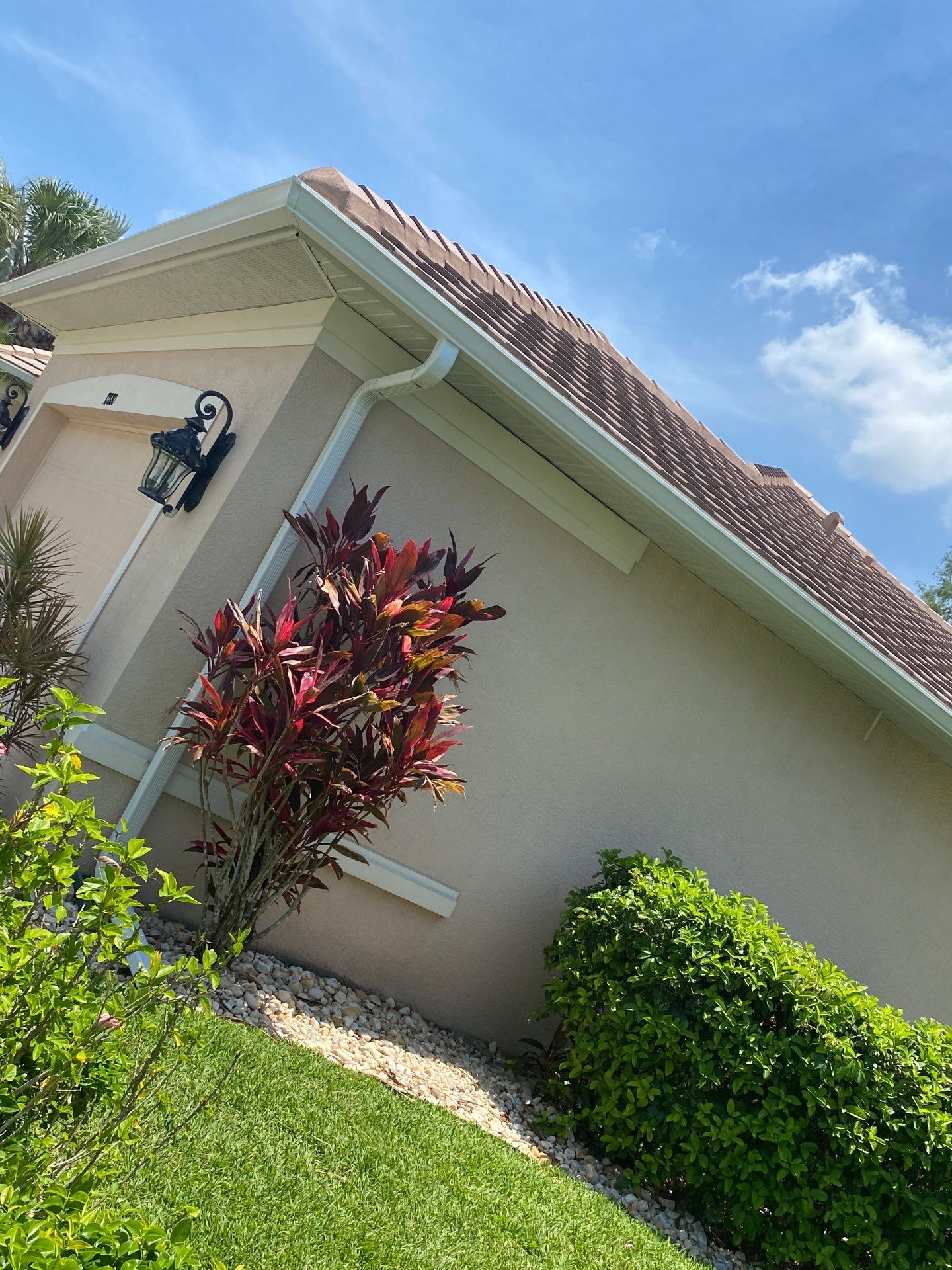 Seamless Gutter Upgrade Before & After in Bonita Springs FL by Gutter Professors