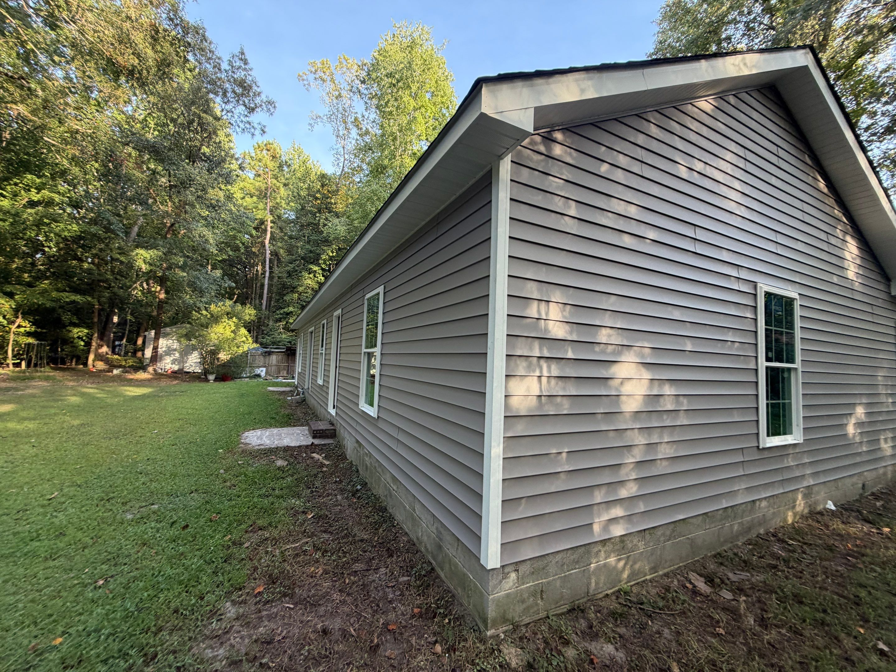 Single-Story New Construction Vinyl Siding Install in Gloucester by Cade Construction